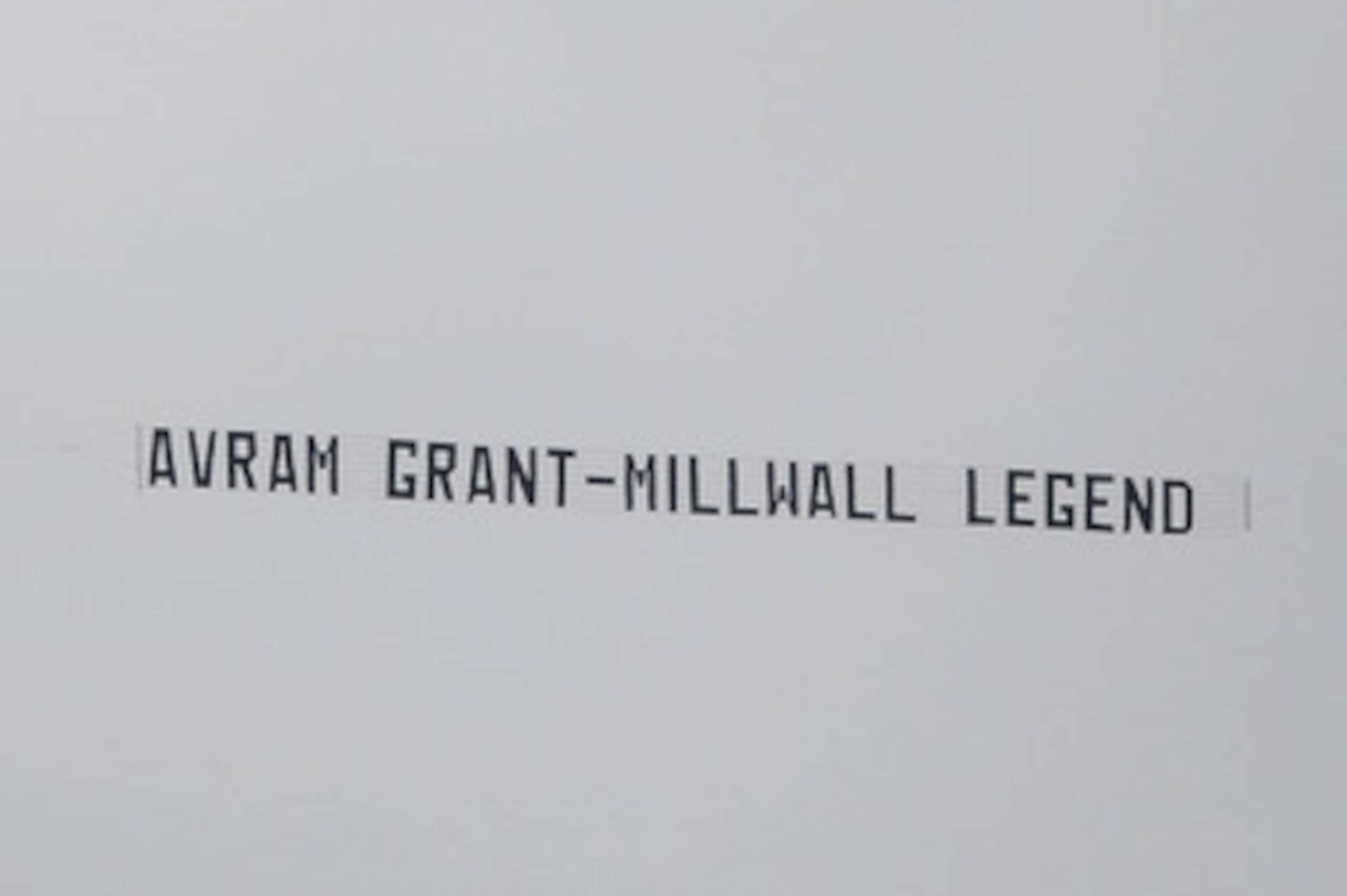 WIGAN, ENGLAND - MAY 15: An aircraft tows a banner above the stadium mocking West Ham Manager Avram Grant during the Barclays Premier League match between Wigan Athletic and West Ham United at the DW Stadium on May 15, 2011 in Wigan, England. (Photo by Ch