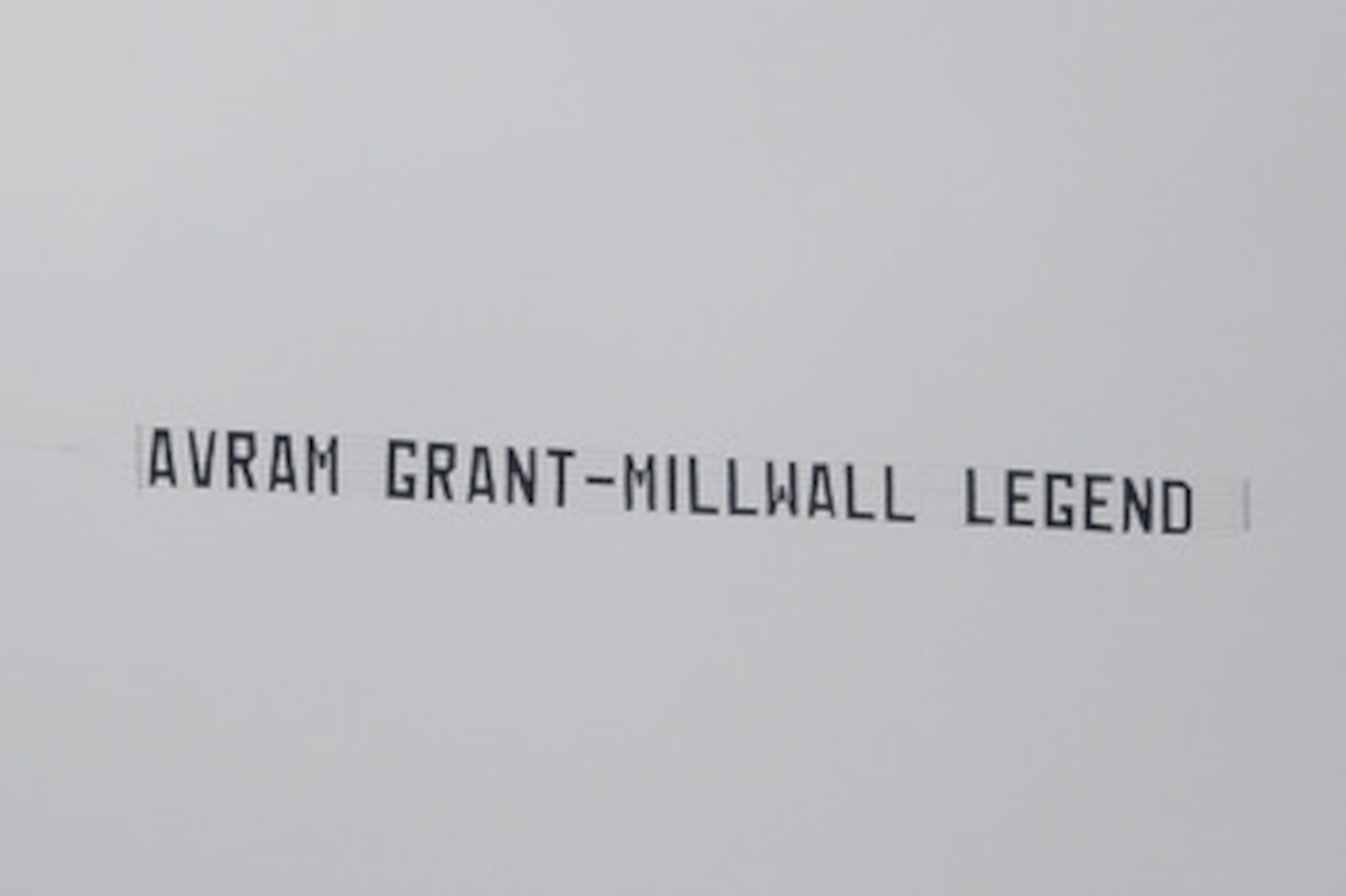 WIGAN, ENGLAND - MAY 15: An aircraft tows a banner above the stadium mocking West Ham Manager Avram Grant during the Barclays Premier League match between Wigan Athletic and West Ham United at the DW Stadium on May 15, 2011 in Wigan, England. (Photo by Ch