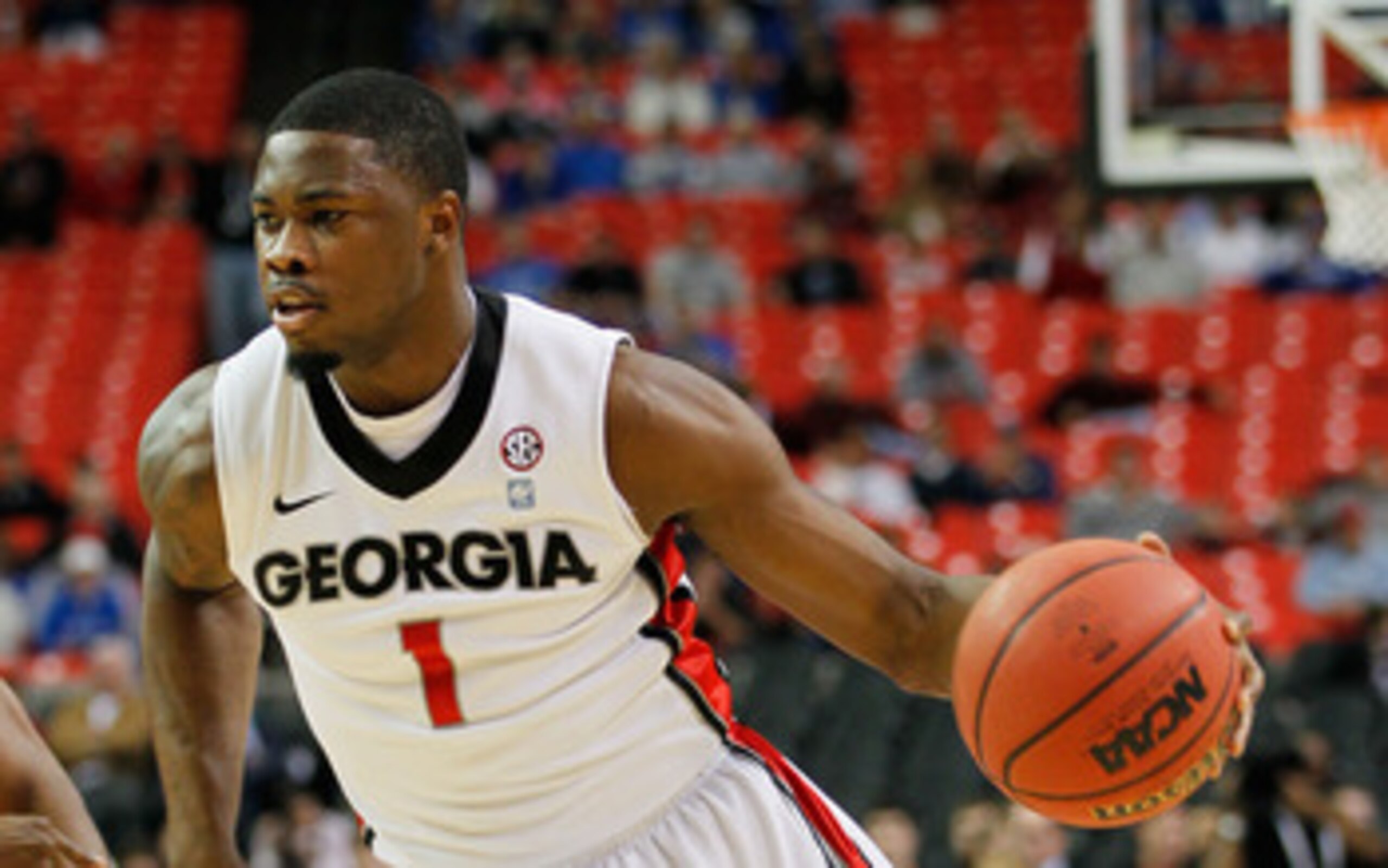 ATLANTA, GA - MARCH 10:  Travis Leslie #1 of the Georgia Bulldogs drives against the Auburn Tigers during the the first round of the SEC Men's Basketball Tournament at the Georgia Dome on March 10, 2011 in Atlanta, Georgia.  (Photo by Kevin C. Cox/Getty I