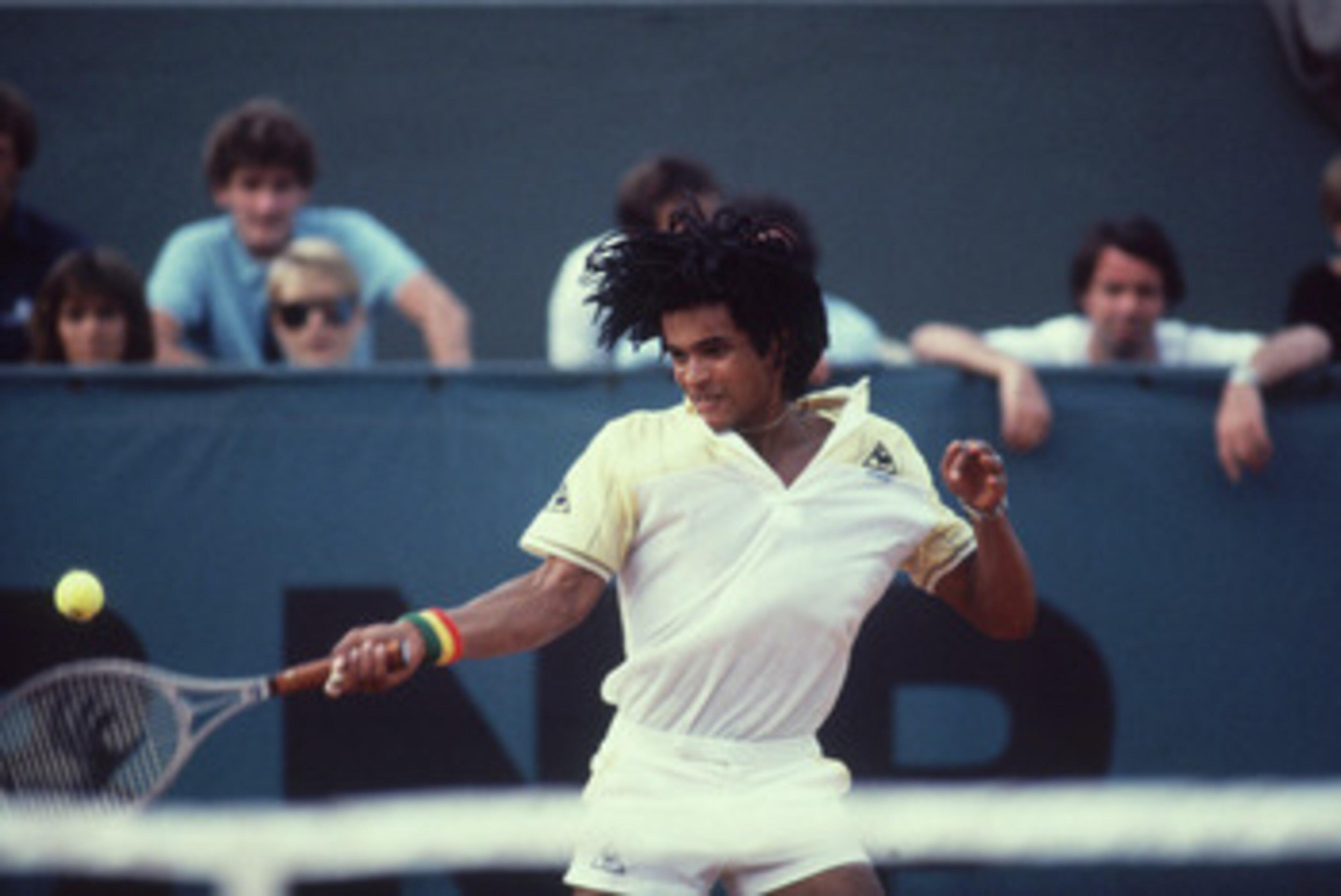 French tennis player Yannick Noah competes in the Men's Singles of the 1983 French Open. (Photo by Steve Powell/Getty Images)