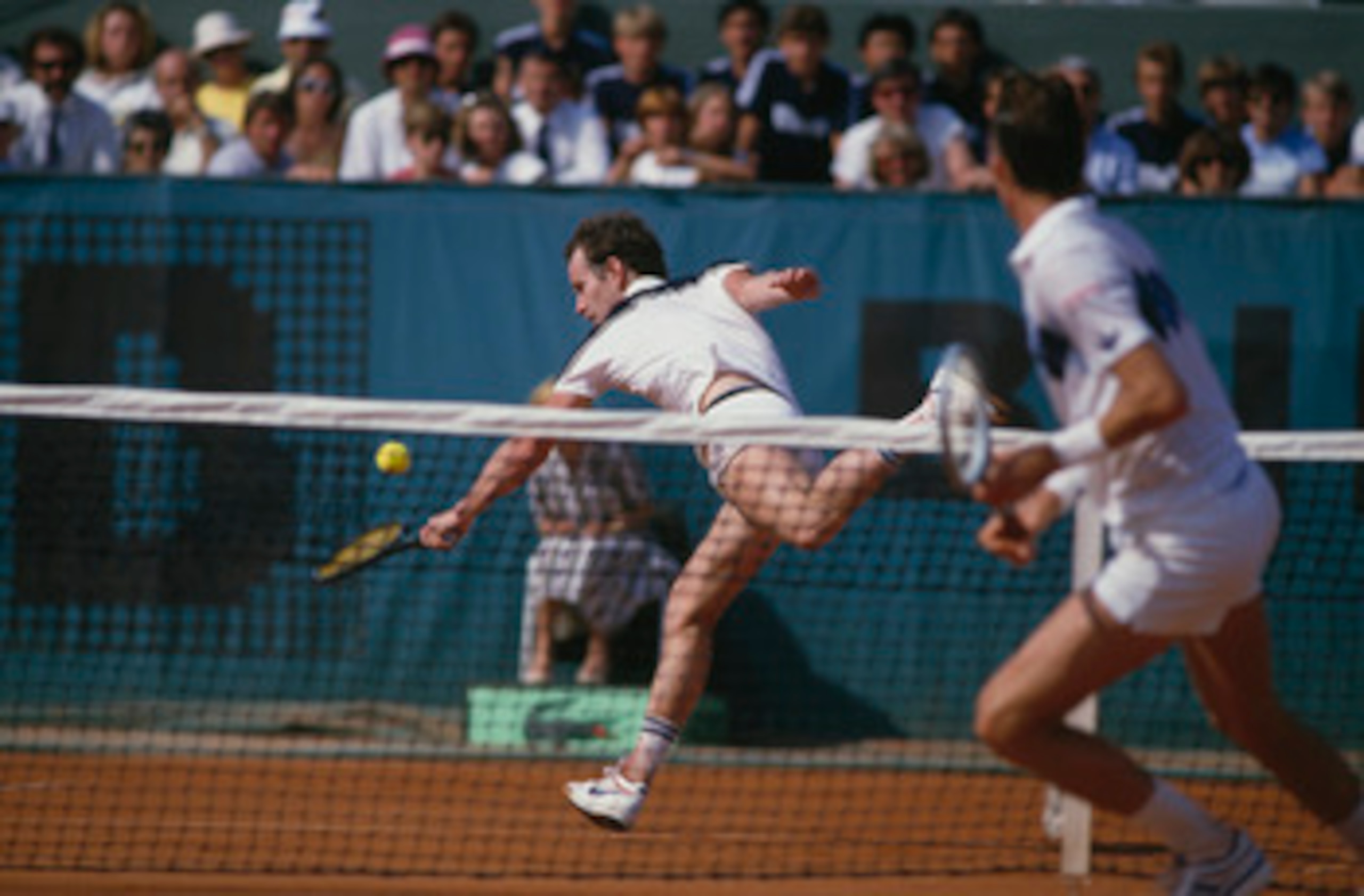 John McEnroe (left) and Ivan Lendl competing in the men's singles final of the Tournoi de Roland-Garros (French Open), at the Stade Roland Garros, Paris, June 1984. Lendl won the match 3-6, 2-6, 6-4, 7-5, 7-5.
(Photo by Steve Powell/Getty Images)