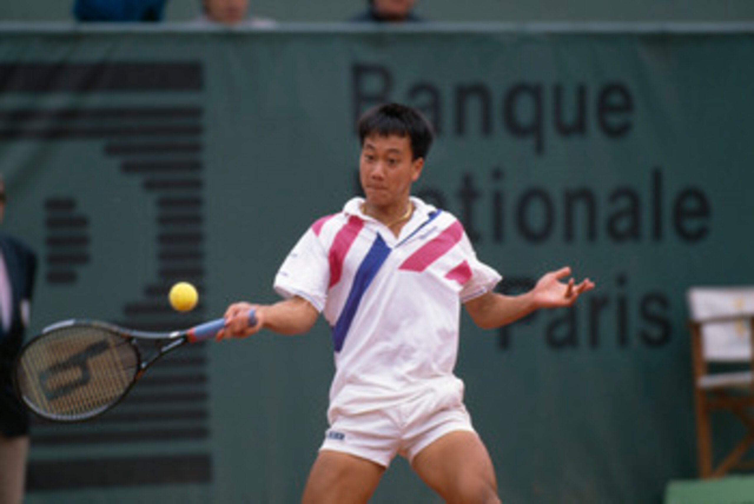 American tennis player Michael Chang at the French Open in Paris, 1989. He won the tournament, becoming the youngest male winner of a Grand Slam singles event at the age of 17. (Photo by Simon Bruty/Getty Images)