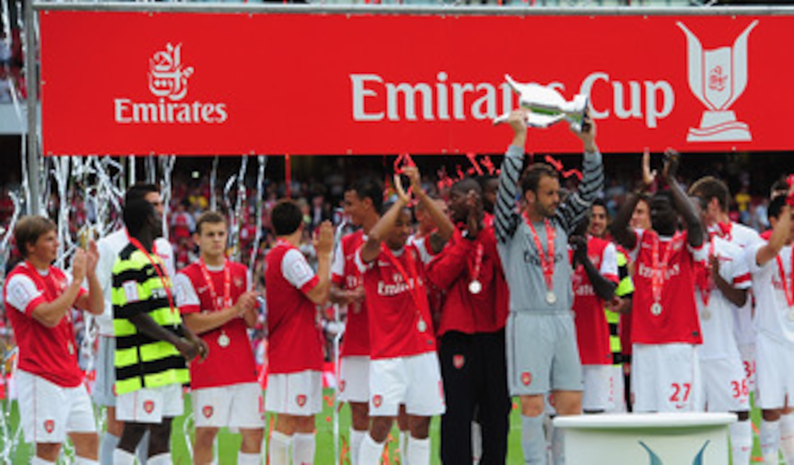 LONDON, ENGLAND - AUGUST 01: Captain Manuel Almunia of Arsenal lifts the winners' trophy after the Emirates Cup match between Arsenal and Celtic  at Emirates Stadium on August 1, 2010 in London, England.  (Photo by Mike Hewitt/Getty Images)
