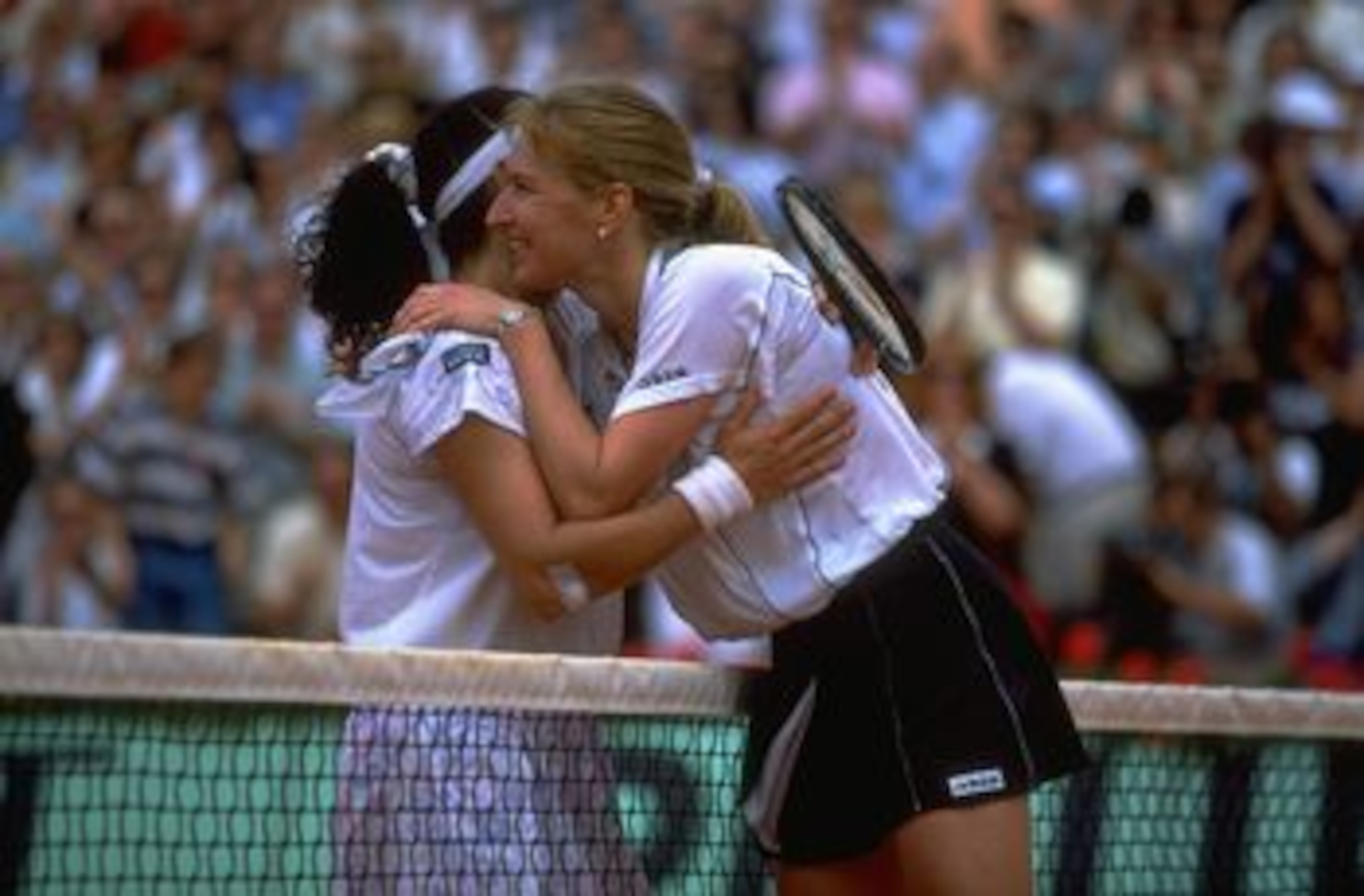 Jun 1996:  Steffi Graf of Germany (right) embraces Arantxa Sanchez-Vicario of Spain after Grafs victory in the final of the French Open at the Roland Garros Stadium, Paris. \ Mandatory Credit: Gary M Prior /Allsport