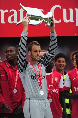LONDON, ENGLAND - AUGUST 01:  Captain Manuel Almunia of Arsenal lifts the winners' trophy after the Emirates Cup match between Arsenal and Celtic  at Emirates Stadium on August 1, 2010 in London, England.  (Photo by Mike Hewitt/Getty Images)