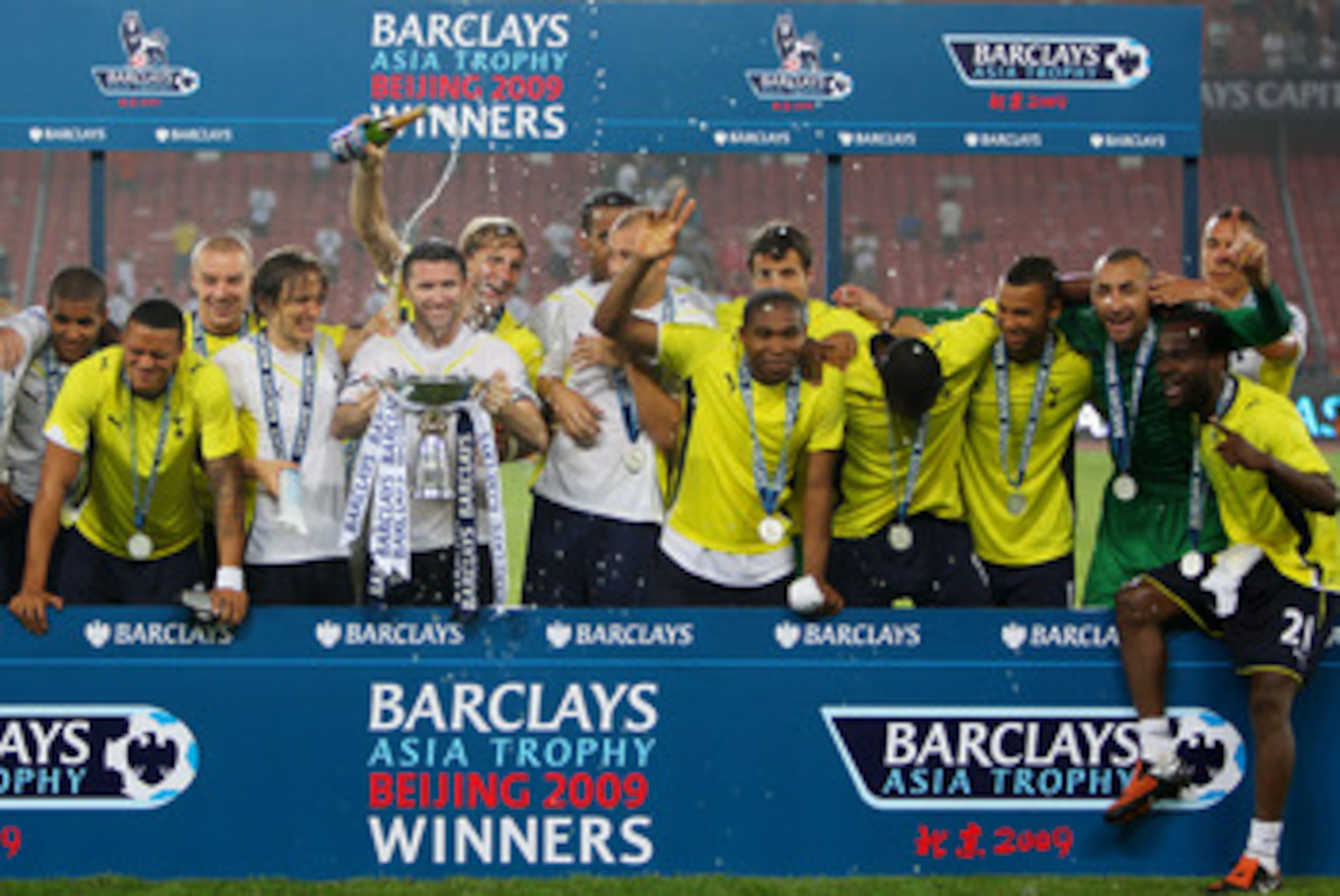 BEIJING - JULY 31:  Players of Tottenham Hotspur celebrate their winning after the Barclays Asia Trophy pre-season friendly match between Tottenham Hotspur and Hull City at Workers Stadium on July 31, 2009 in Beijing, China.  (Photo by Feng Li/Getty Image