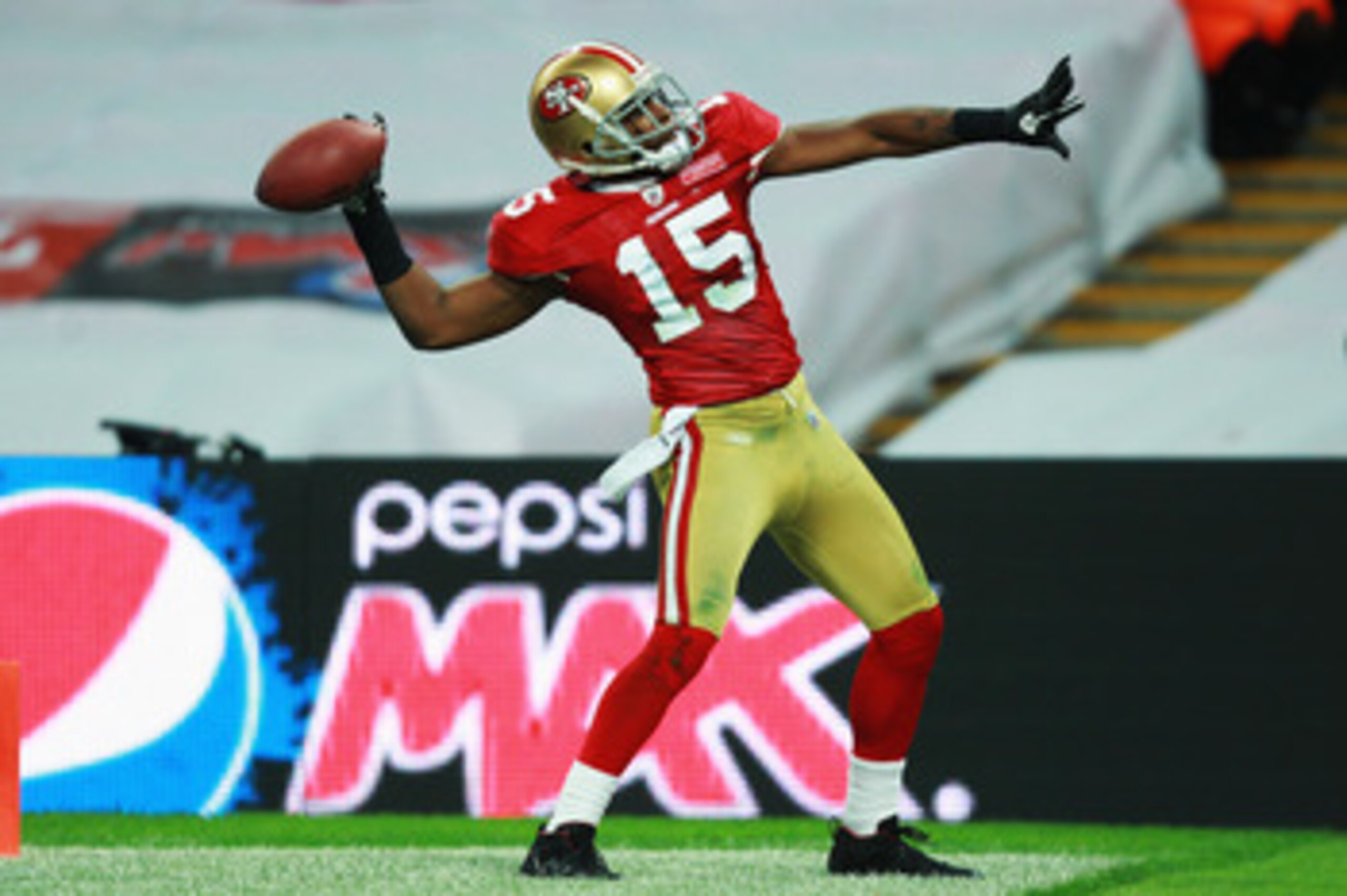 LONDON, ENGLAND - OCTOBER 31:  Michael Crabtree #15 of San Francisco 49ers celebrates as he scores their second touchdown during the NFL International Series match between Denver Broncos and San Francisco 49ers at Wembley Stadium on October 31, 2010 in Lo