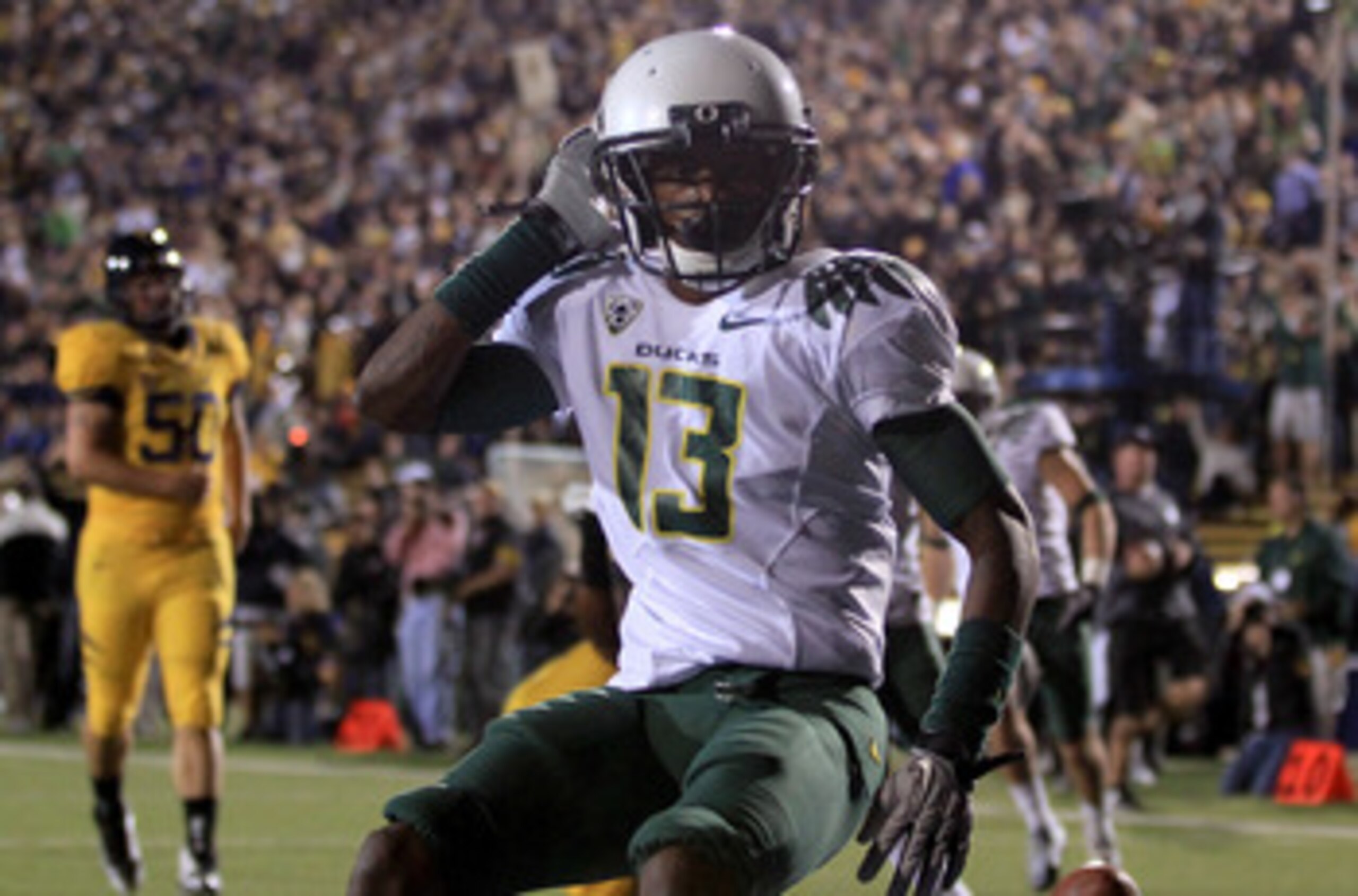 BERKELEY, CA - NOVEMBER 13:  Cliff Harris #13 of the Oregon Ducks celebrates after he returned a punt for a touchdown against the California Golden Bears  at California Memorial Stadium on November 13, 2010 in Berkeley, California.  (Photo by Ezra Shaw/Ge