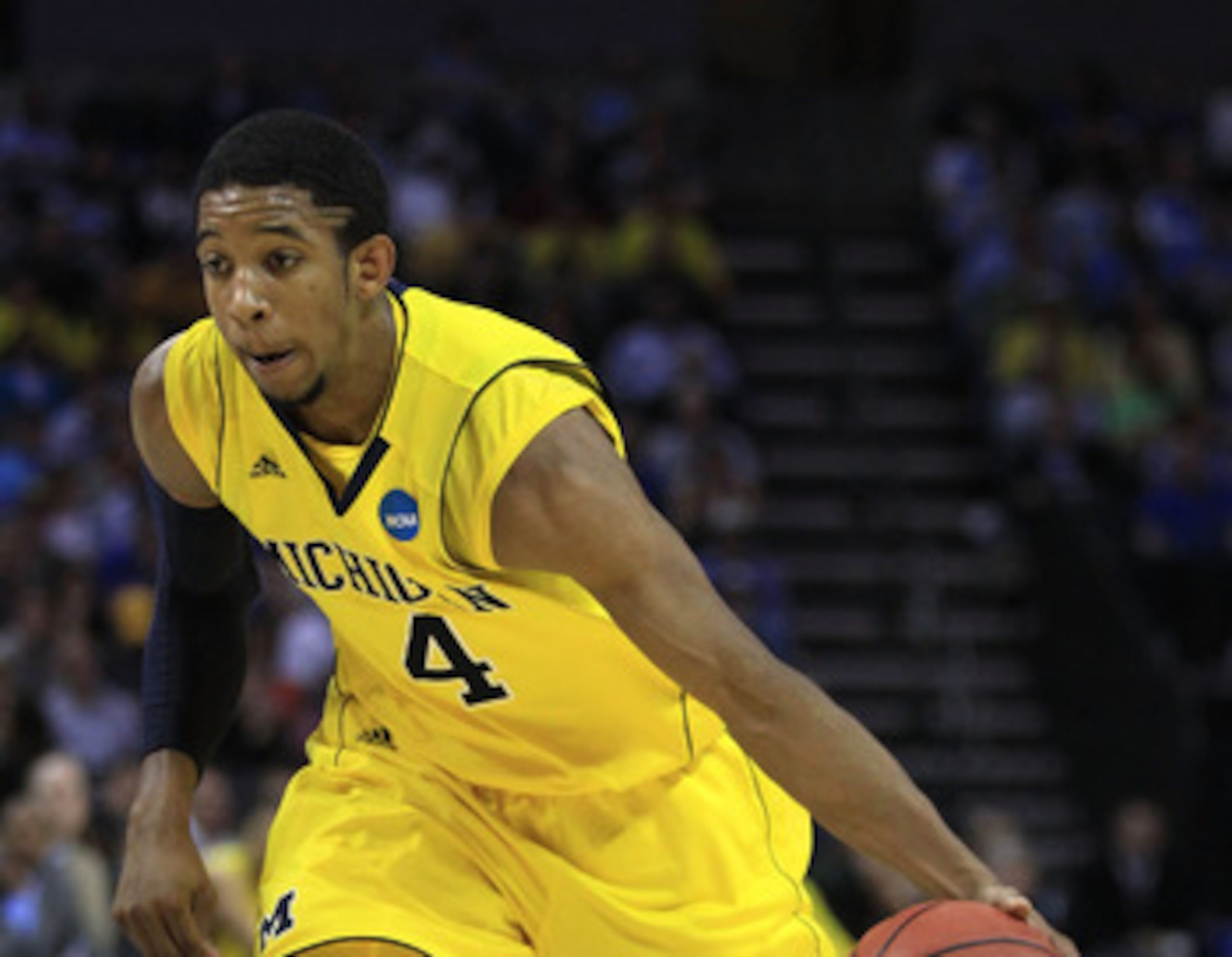 CHARLOTTE, NC - MARCH 20:  Darius Morris #4 of the Michigan Wolverines moves the ball while taking on the Duke Blue Devils during the third round of the 2011 NCAA men's basketball tournament at Time Warner Cable Arena on March 20, 2011 in Charlotte, North