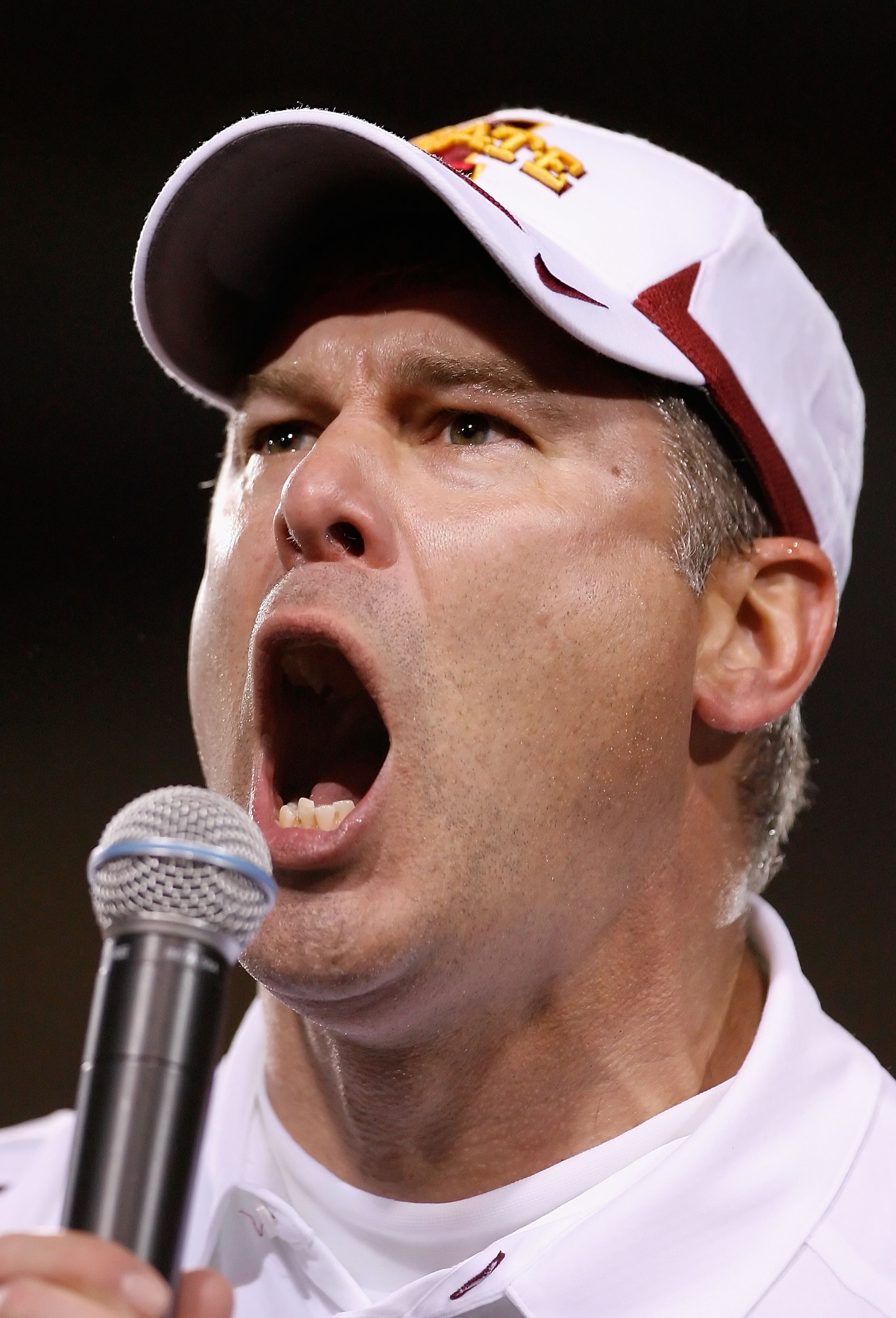TEMPE, AZ - DECEMBER 31:  Head coach Paul Rhoads of the Iowa State Cyclones speaks to the crowd after defeating the Minnesota Golden Gophers in the Insight Bowl at Arizona Stadium on December 31, 2009 in Tempe, Arizona.  The Cyclones defeated the Golden G
