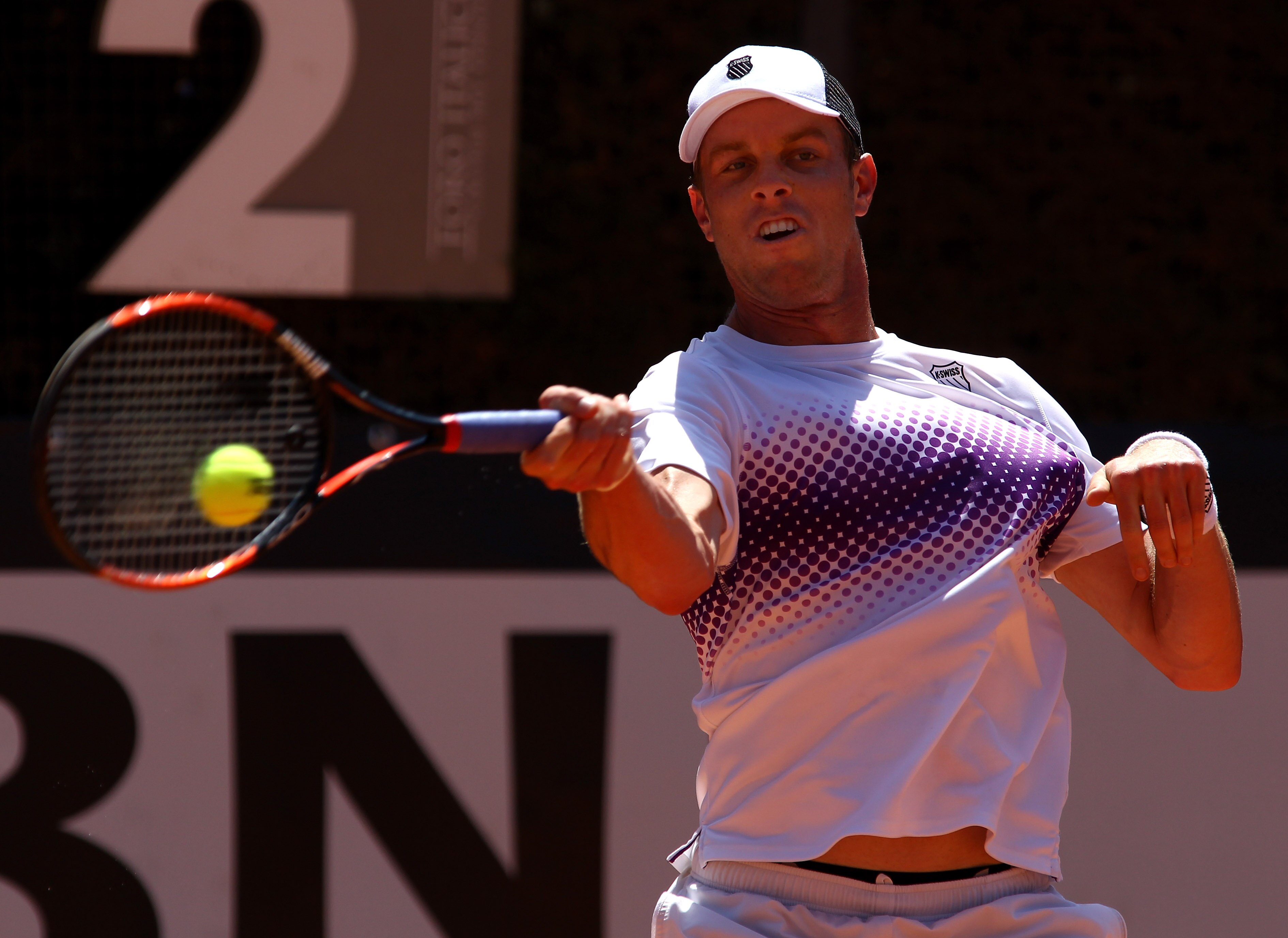 ROME, ITALY - MAY 11:  Sam Querrey of USA plays a forehand return during his second round match against Nicolas Almagro of Spain during day four of the Internazionali BNL d'Italia at the Foro Italico Tennis Centreon May 11, 2011 in Rome, Italy.  (Photo by