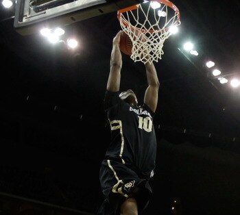 KANSAS CITY, MO - MARCH 11:  Alec Burks #10 of the Colorado Buffaloes dunks the ball against the Kansas Jayhawks during their semifinal game in the 2011 Phillips 66 Big 12 Men's Basketball Tournament at Sprint Center on March 11, 2011 in Kansas City, Miss