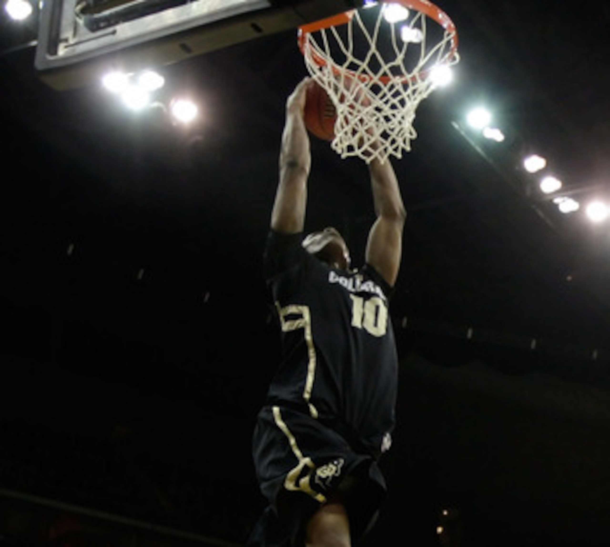 KANSAS CITY, MO - MARCH 11:  Alec Burks #10 of the Colorado Buffaloes dunks the ball against the Kansas Jayhawks during their semifinal game in the 2011 Phillips 66 Big 12 Men's Basketball Tournament at Sprint Center on March 11, 2011 in Kansas City, Miss