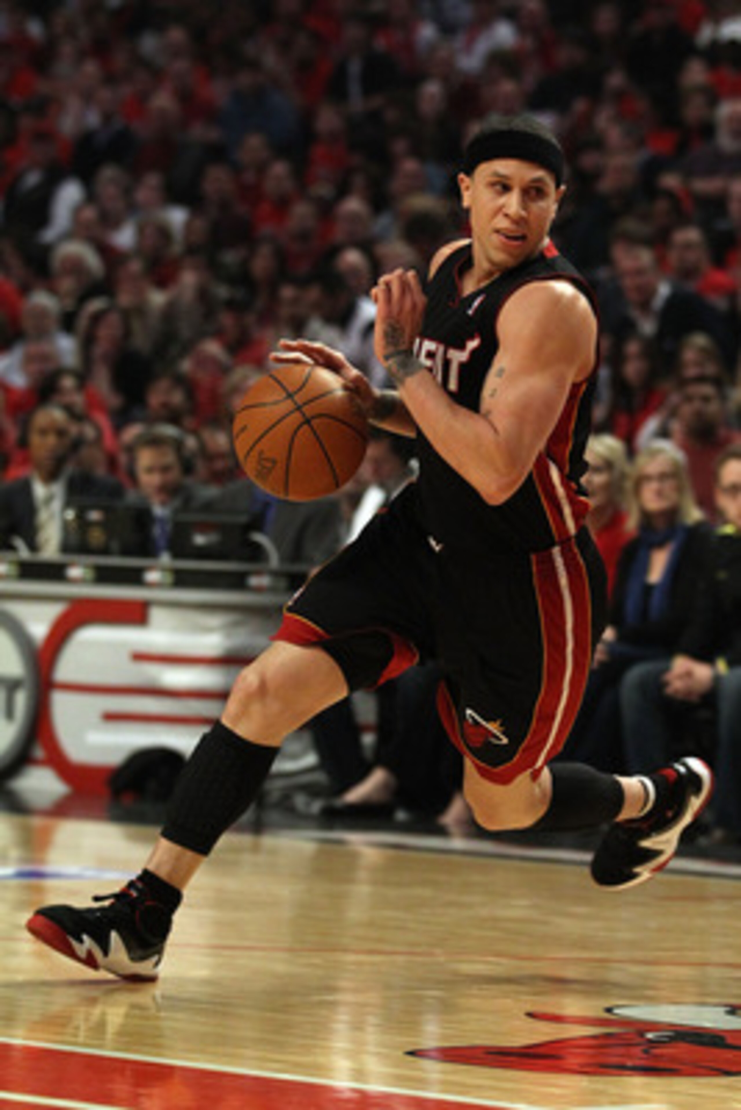 CHICAGO, IL - MAY 15:  Mike Bibby #0 of the Miami Heat drives against the Chicago Bulls in Game One of the Eastern Conference Finals during the 2011 NBA Playoffs on May 15, 2011 at the United Center in Chicago, Illinois. The Bulls won 103-82. NOTE TO USER