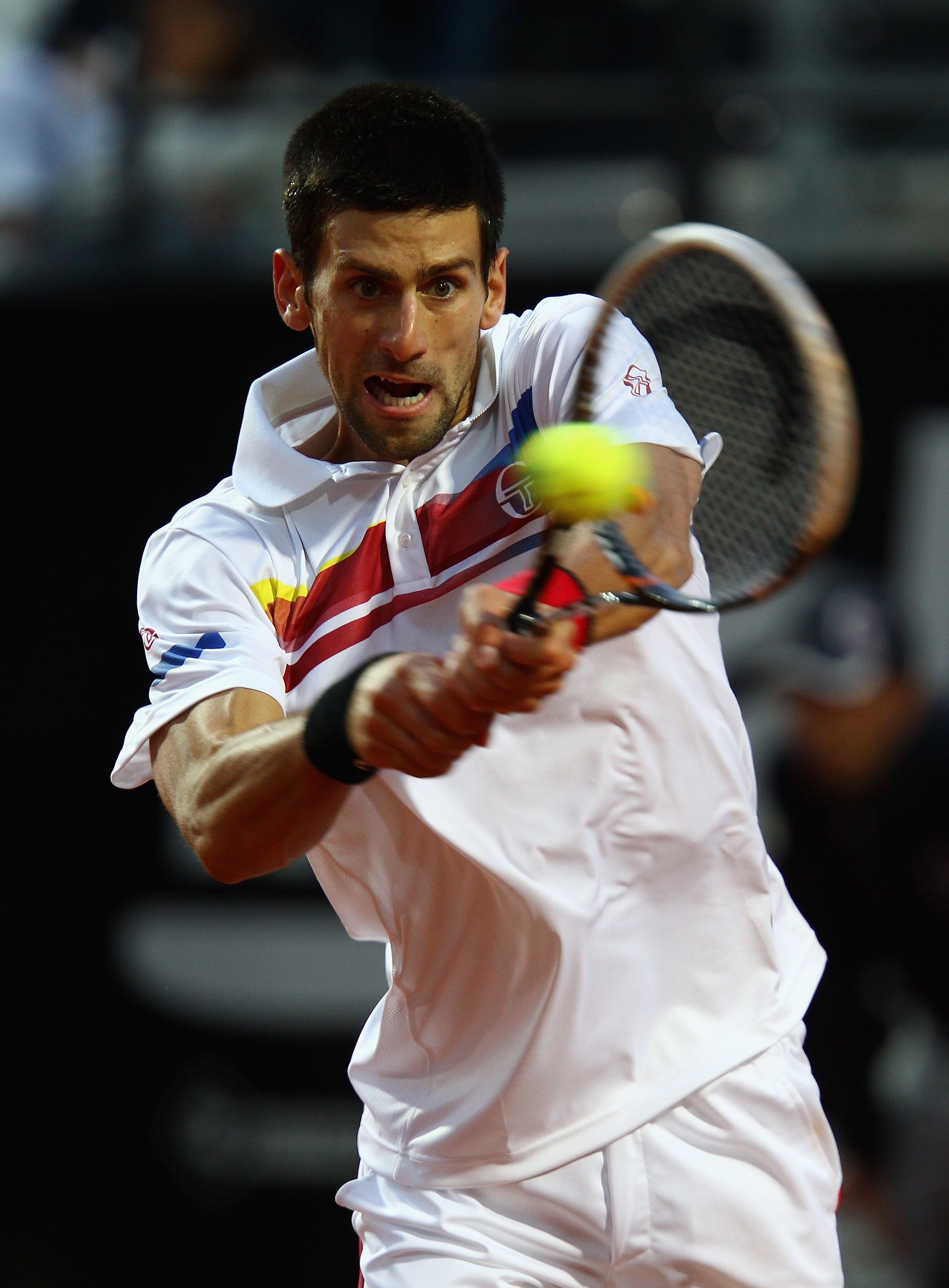 ROME, ITALY - MAY 15:  Novak Djokovic of Serbia in action during the final against Rafael Nadal of Spain during day eight of the Internazoinali BNL D'Italia at the Foro Italico Tennis Centre on May 15, 2011 in Rome, Italy.  (Photo by Clive Brunskill/Getty