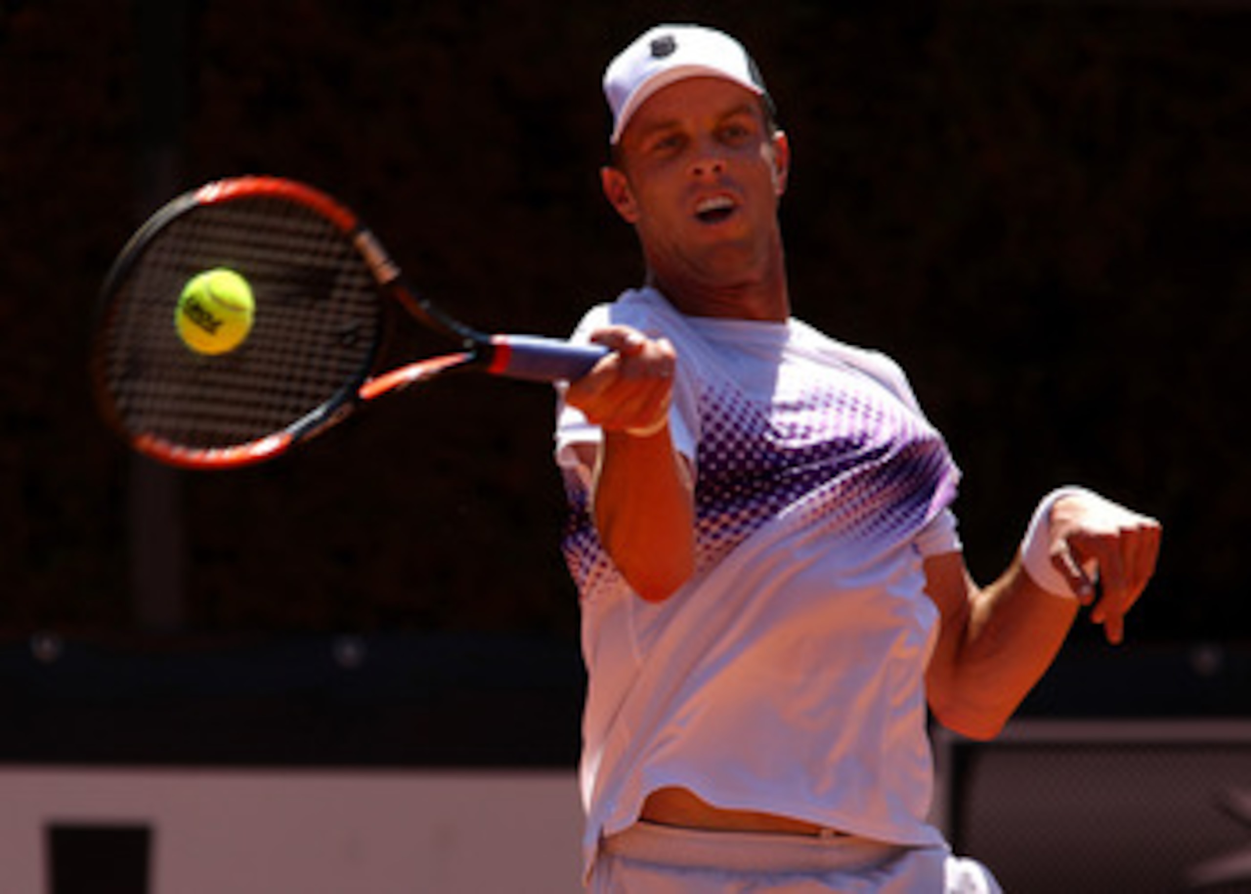 ROME, ITALY - MAY 11:  Sam Querrey of USA plays a forehand return during his second round match against Nicolas Almagro of Spain during day four of the Internazionali BNL d'Italia at the Foro Italico Tennis Centreon May 11, 2011 in Rome, Italy.  (Photo by