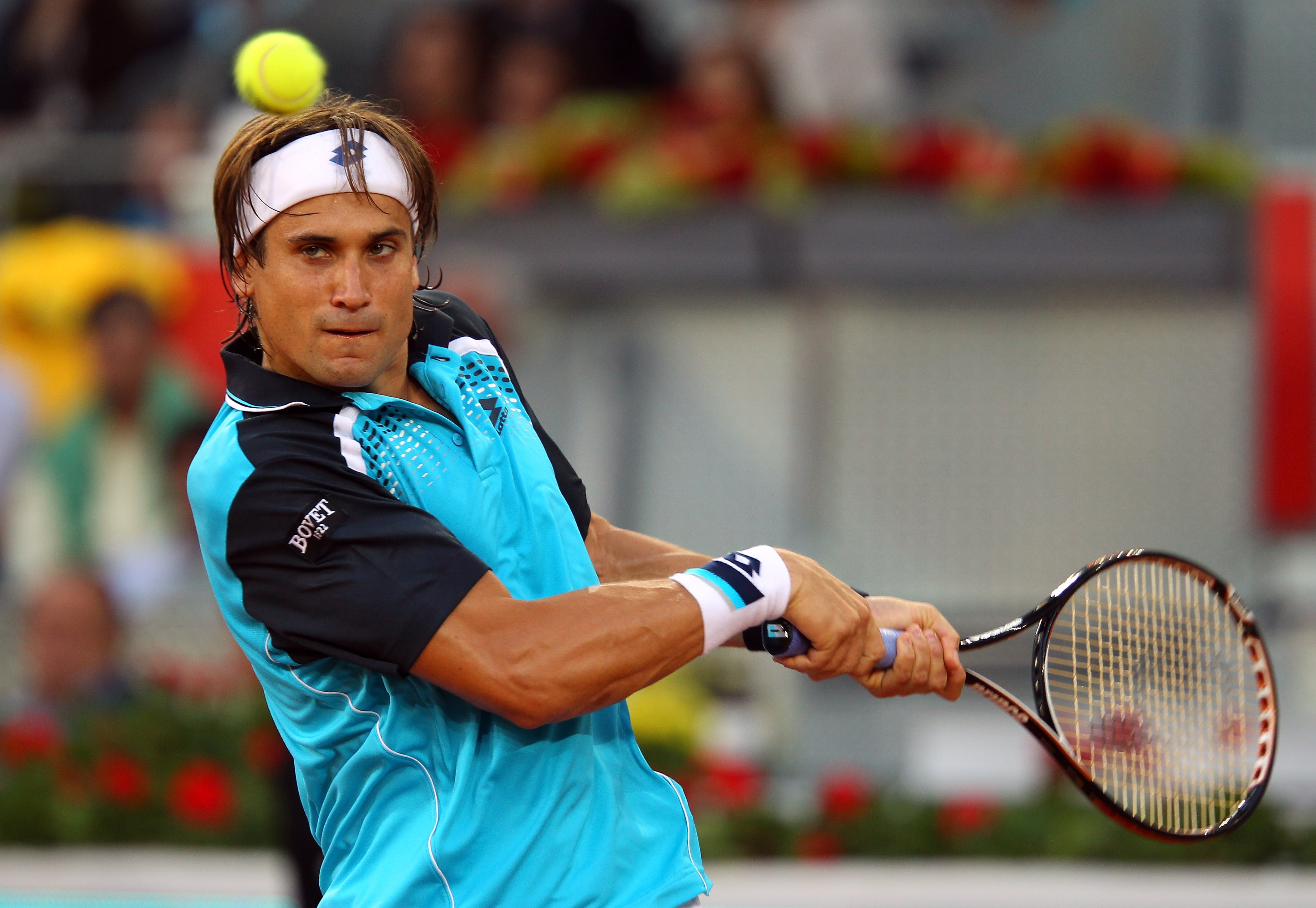 MADRID, SPAIN - MAY 03:  David Ferrer of Spain in action in his match against Adrian Mannarino of France during day four of the Mutua Madrilena Madrid Open Tennis on May 3, 2011 in Madrid, Spain.  (Photo by Julian Finney/Getty Images)