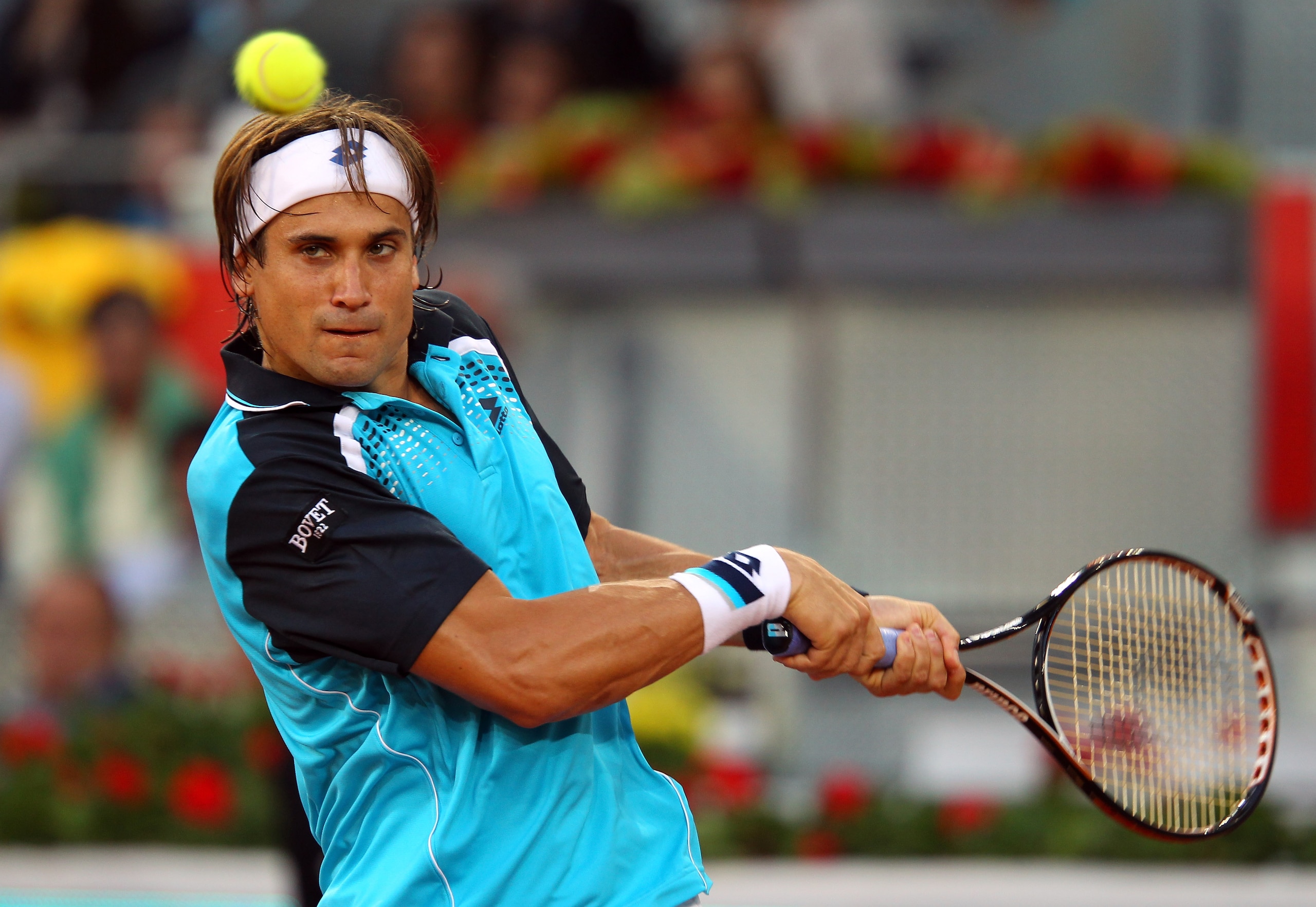 MADRID, SPAIN - MAY 03:  David Ferrer of Spain in action in his match against Adrian Mannarino of France during day four of the Mutua Madrilena Madrid Open Tennis on May 3, 2011 in Madrid, Spain.  (Photo by Julian Finney/Getty Images)
