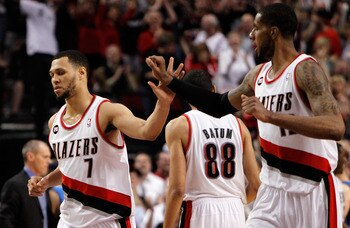 PORTLAND, OR - APRIL 23:  Brandon Roy #7 high fives LaMarcus Aldridge #12 of the Portland Trail Blazers against the Dallas Mavericks in Game Four of the Western Conference Quarterfinals in the 2011 NBA Playoffs on April 23, 2011 at the Rose Garden in Port