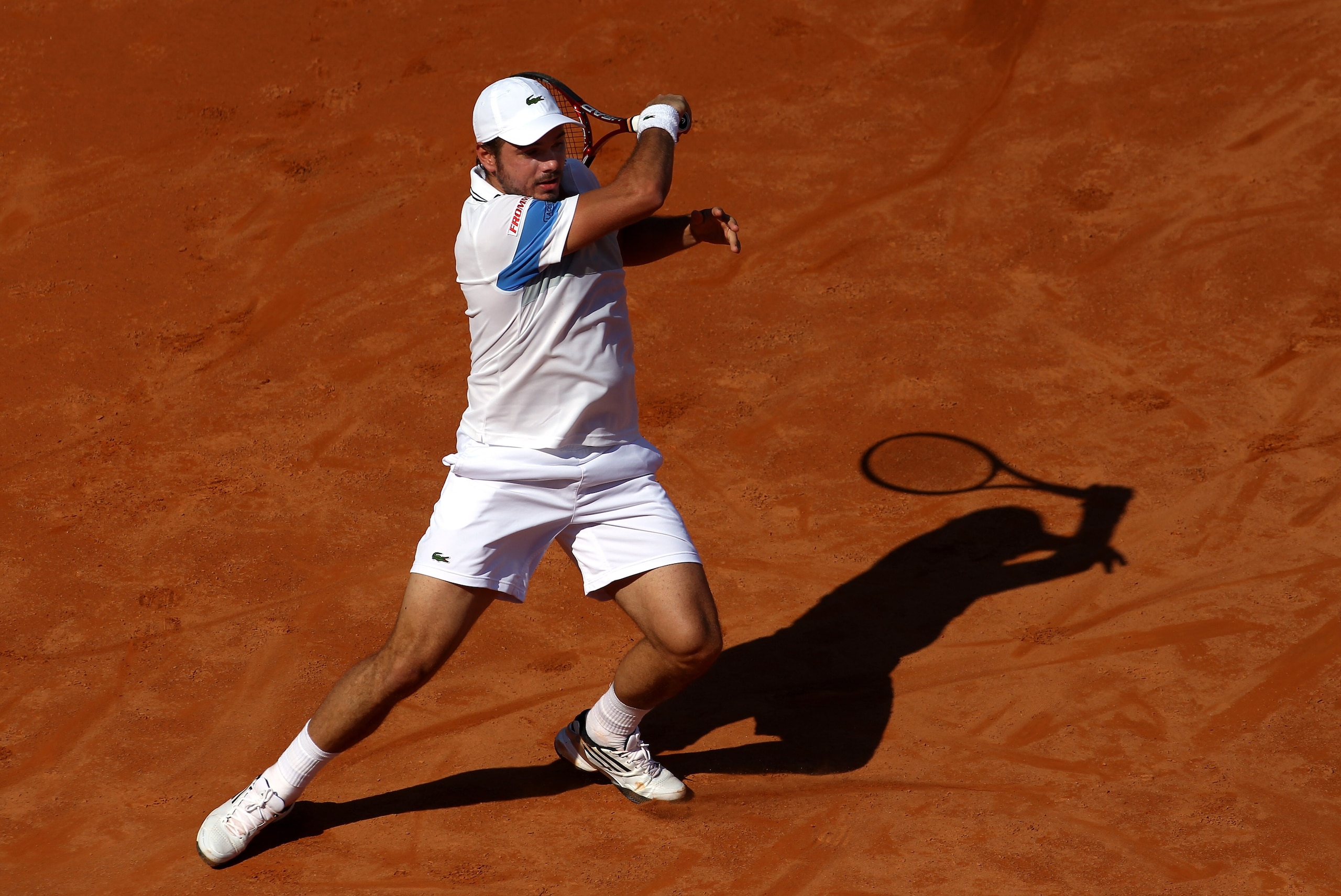 ROME, ITALY - MAY 10:  Stanislav Wawrinka of Switzerland plays a forehand return during his first round match against Fabio Fognini of Italy during day three of the Internazionali BNL d'Italia at the Foro Italico Tennis Centre on May 10, 2011 in Rome, Ita