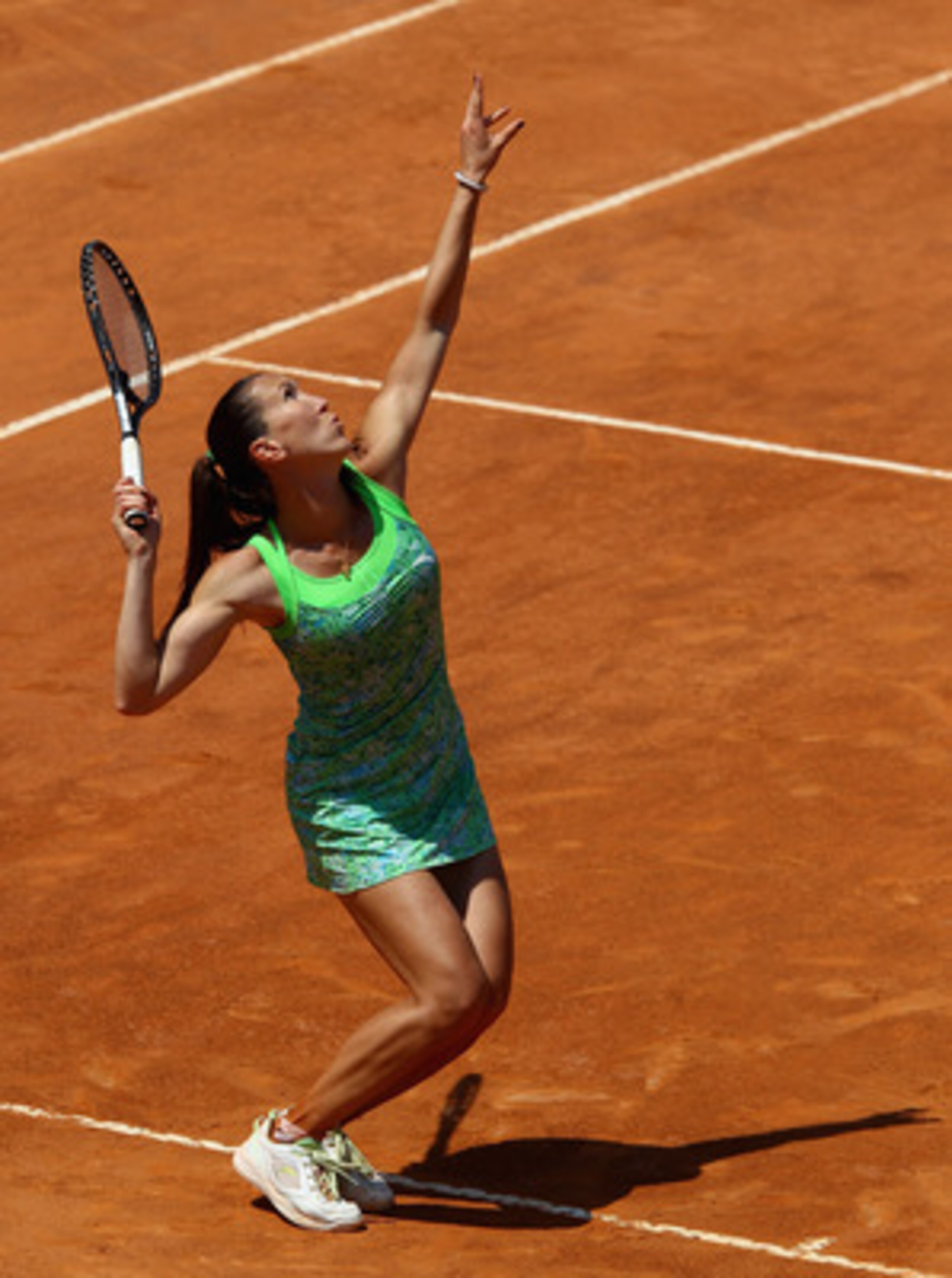 ROME, ITALY - MAY 12:  Jelena Jankovic of Serbia serves during her third round match against Anabel Medina Garrigues of Spain during day five of the Internazoinali BNL D'Italia at the Foro Italico Tennis Centre on May 12, 2011 in Rome, Italy.  (Photo by C