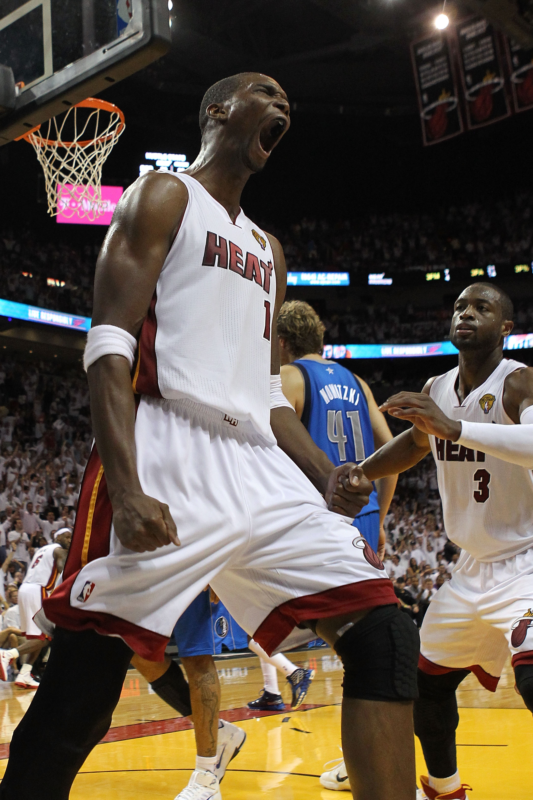 MIAMI, FL - JUNE 02:  Chris Bosh #1 of the Miami Heat reacts in the fourth quarter while taking on the Dallas Mavericks in Game Two of the 2011 NBA Finals at American Airlines Arena on June 2, 2011 in Miami, Florida. NOTE TO USER: User expressly acknowled