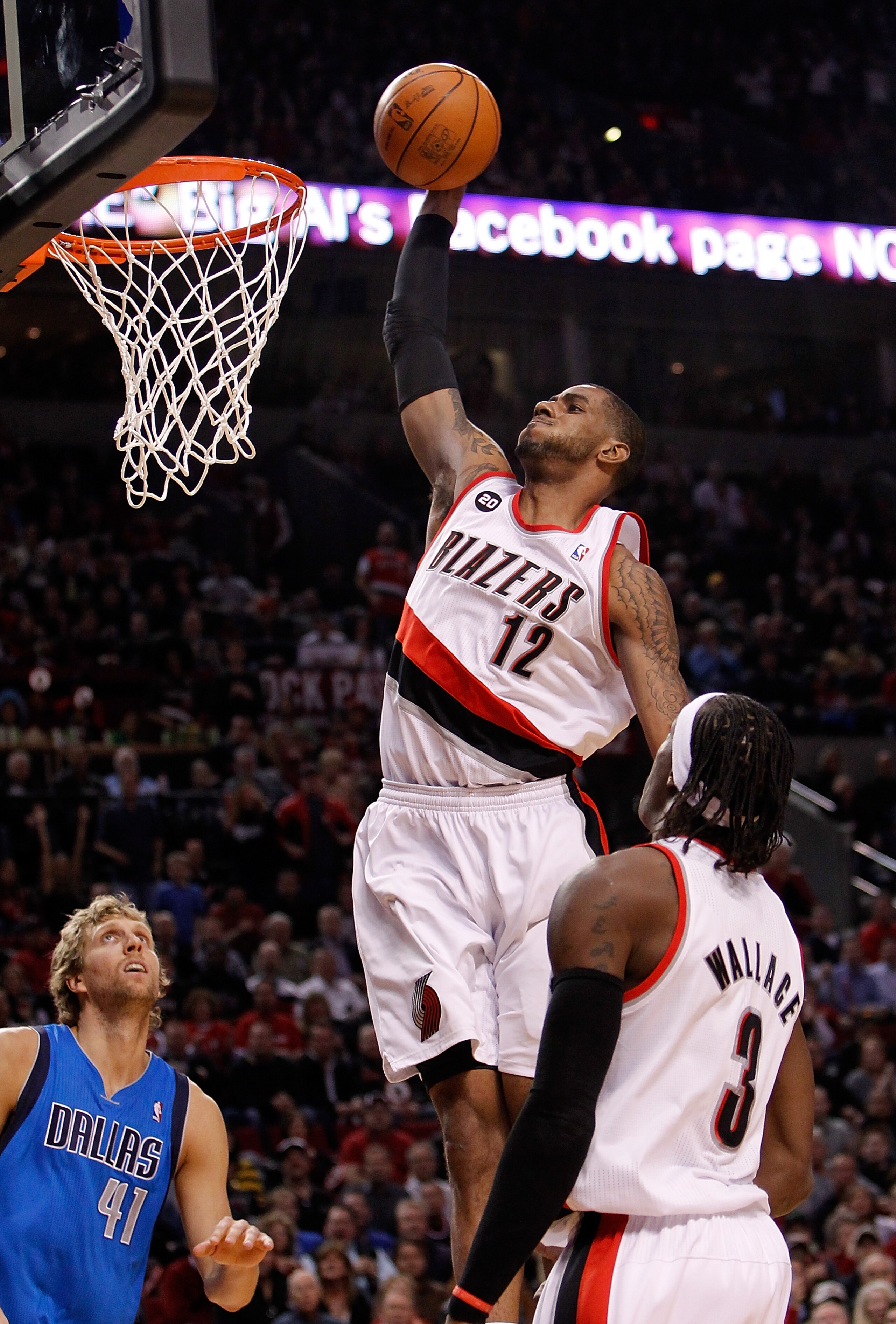 PORTLAND, OR - APRIL 21:  LaMarcus Aldridge #12 of the Portland Trail Blazers dunks against the Dallas Mavericks in Game Three of the Western Conference Quarterfinals in the 2011 NBA Playoffs on April 21, 2011 at the Rose Garden in Portland, Oregon. NOTE