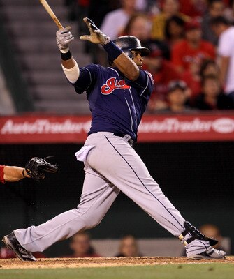 ANAHEIM, CA - MAY 7:  Carlos Santana #41 of the Cleveland Indians hits an RBI single in the fifth inning against the Los Angeles Angels of Anaheim on May 7, 2011 at Angel Stadium in Anaheim, California.    (Photo by Stephen Dunn/Getty Images)