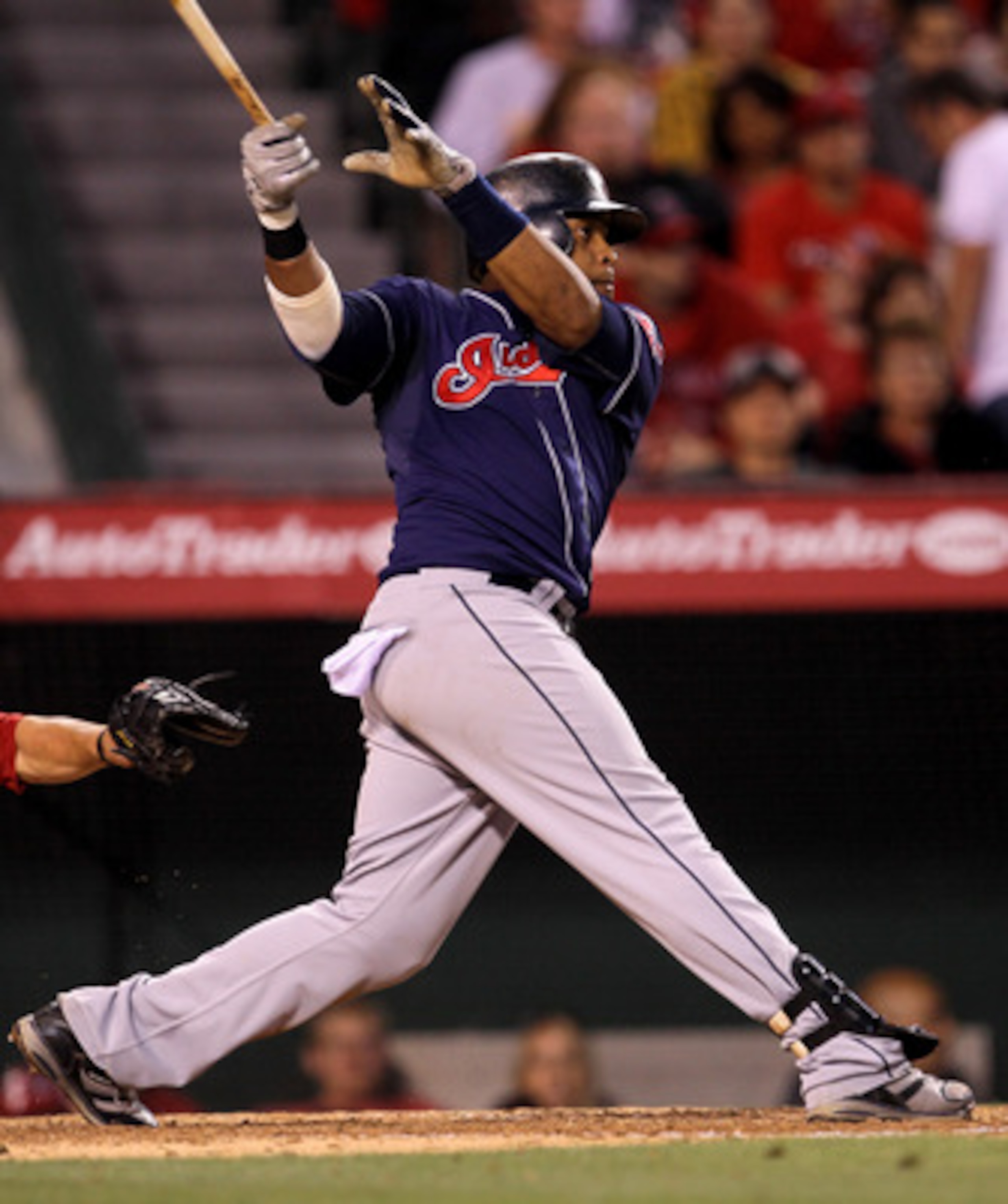 ANAHEIM, CA - MAY 7:  Carlos Santana #41 of the Cleveland Indians hits an RBI single in the fifth inning against the Los Angeles Angels of Anaheim on May 7, 2011 at Angel Stadium in Anaheim, California.    (Photo by Stephen Dunn/Getty Images)