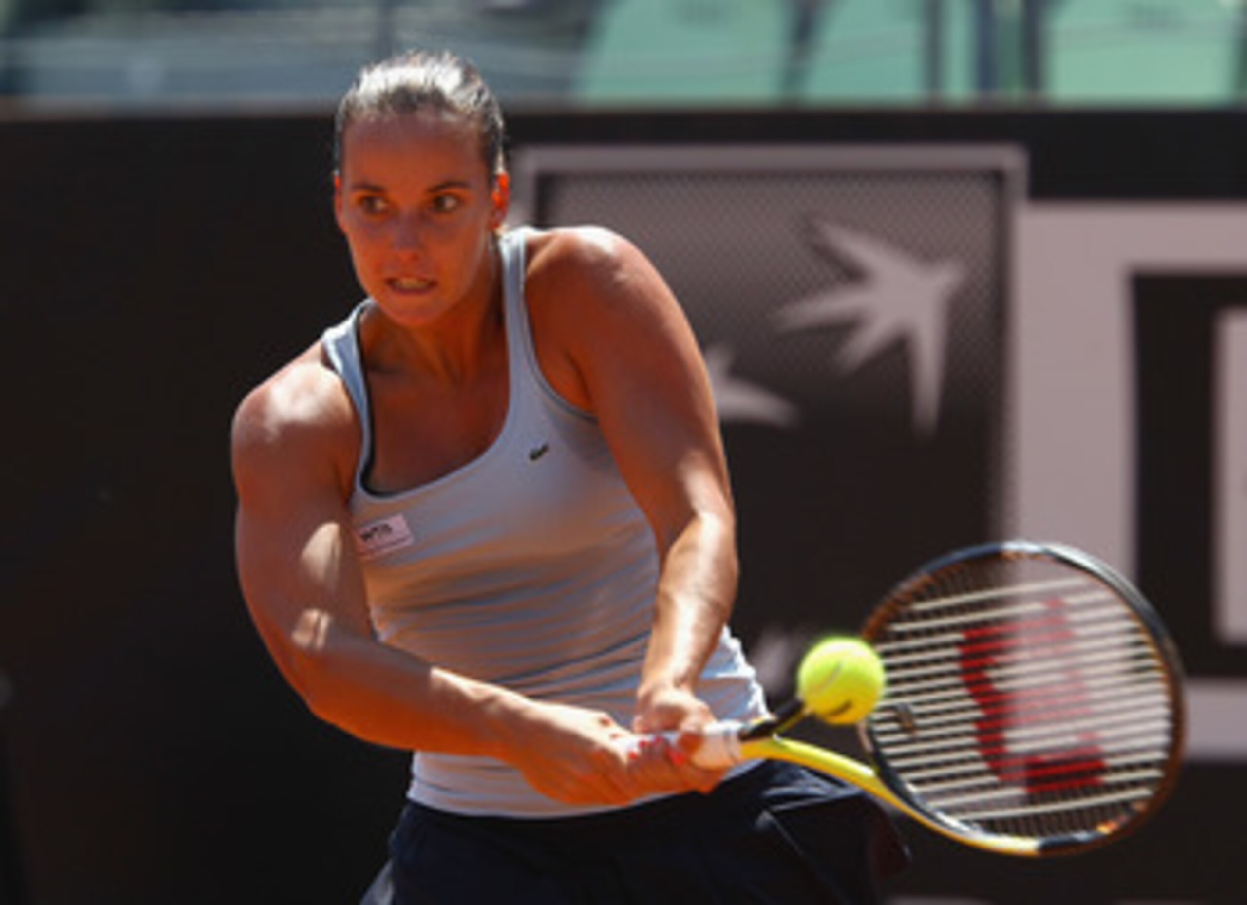 ROME, ITALY - MAY 12:  Jarmila Gajdosova of Australia plays a backhand during her third round defeat against Na Li of China during day five of the Internazoinali BNL D'Italia at the Foro Italico Tennis Centre on May 12, 2011 in Rome, Italy.  (Photo by Cli