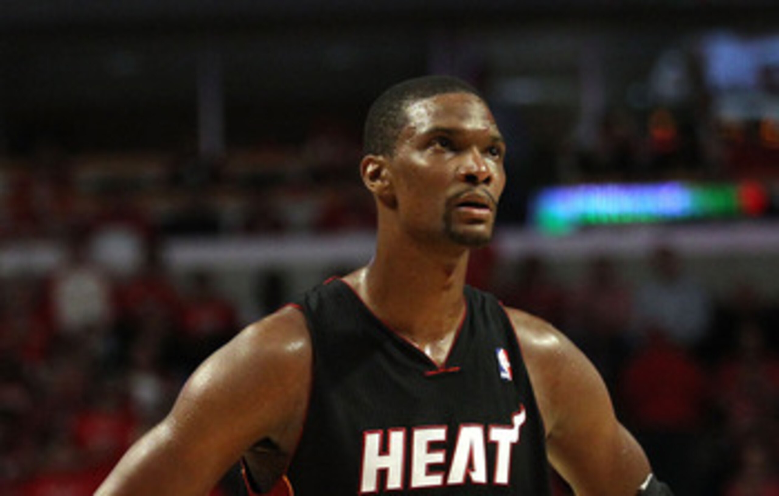 CHICAGO, IL - MAY 15:  Chris Bosh #1 of the Miami Heat looks on against the Chicago Bulls in Game One of the Eastern Conference Finals during the 2011 NBA Playoffs on May 15, 2011 at the United Center in Chicago, Illinois. The Bulls won 103-82. NOTE TO US