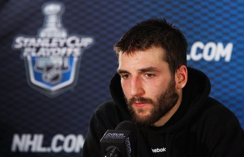 TAMPA, FL - MAY 19:  Patrice Bergeron #37 of the Boston Bruins speaks to the media after they defeated the Tampa Bay Lightning 2 to 0 in Game Three of the Eastern Conference Finals during the 2011 NHL Stanley Cup Playoffs at St Pete Times Forum on May 19,