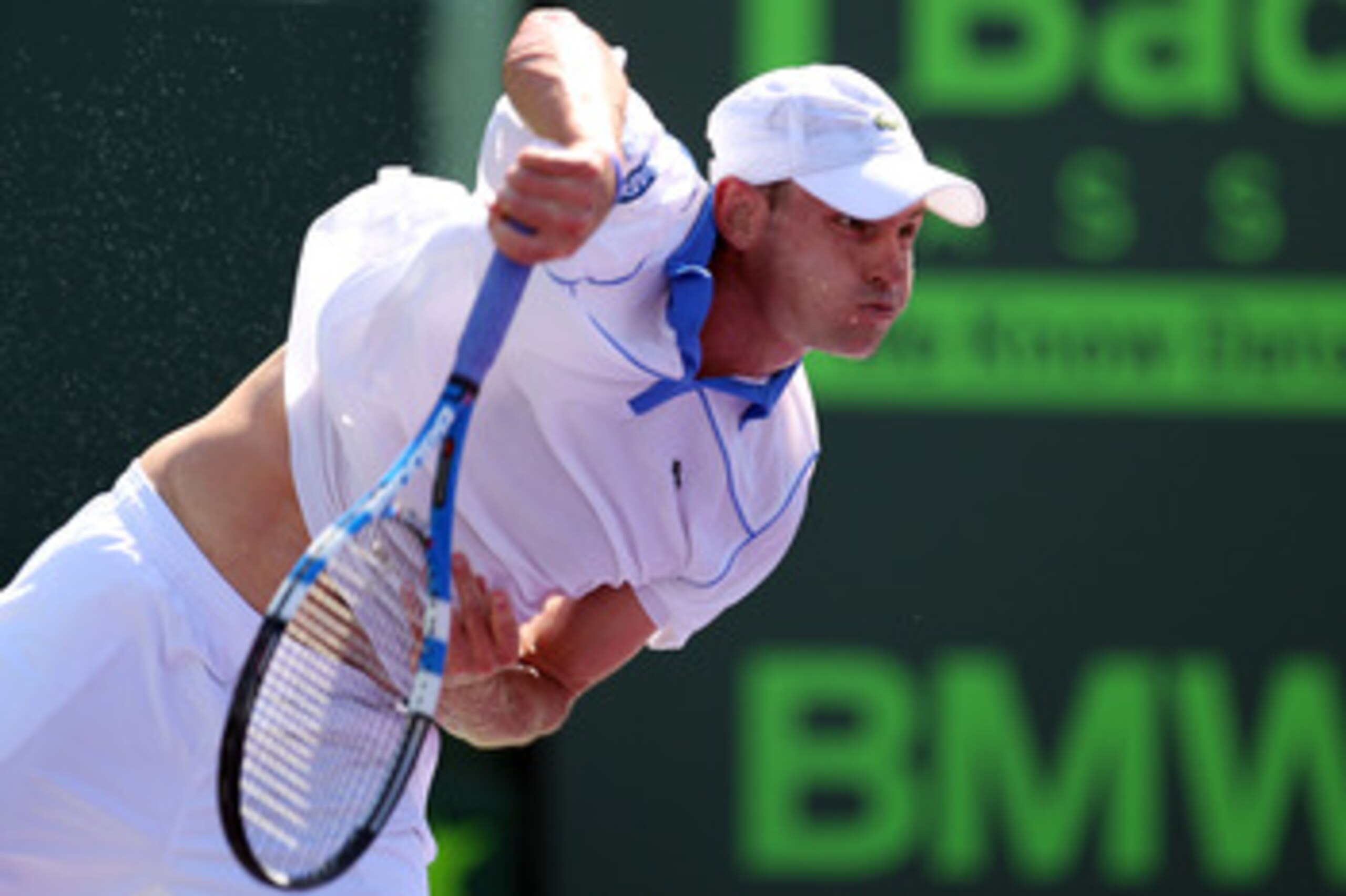 KEY BISCAYNE, FL - MARCH 26:  Andy Roddick serves against Pablo Cuevas of Uruguay during the Sony Ericsson Open at Crandon Park Tennis Center on March 26, 2011 in Key Biscayne, Florida.  (Photo by Al Bello/Getty Images)