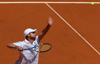 ROME, ITALY - MAY 09:  Andy Roddick of the USA serves during his first round match against Gilles Simon of France during day two of the Internazoinali BNL D'Italia at the Foro Italico Tennis Centre on May 9, 2011 in Rome, Italy.  (Photo by Clive Brunskill
