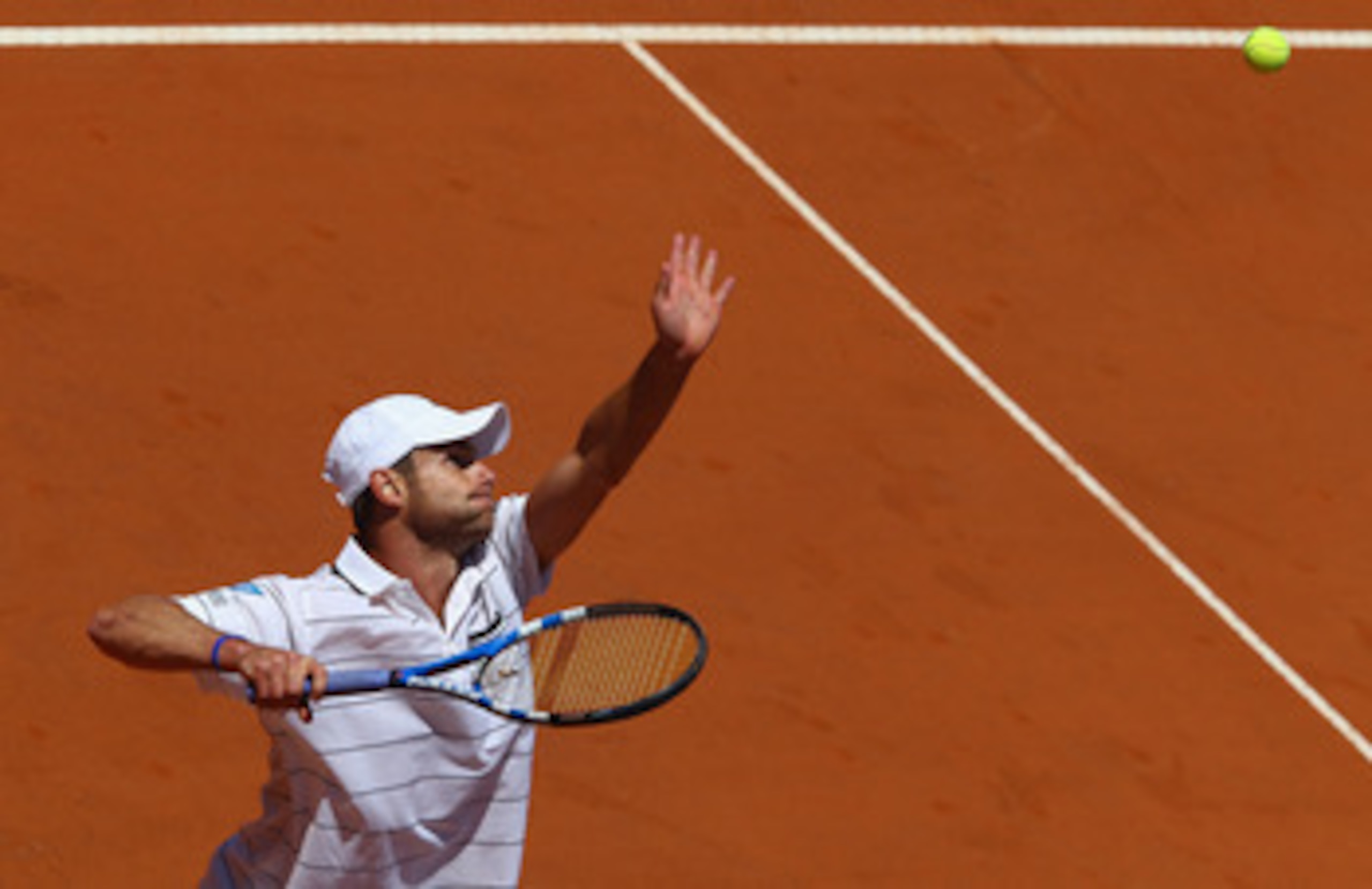 ROME, ITALY - MAY 09:  Andy Roddick of the USA serves during his first round match against Gilles Simon of France during day two of the Internazoinali BNL D'Italia at the Foro Italico Tennis Centre on May 9, 2011 in Rome, Italy.  (Photo by Clive Brunskill