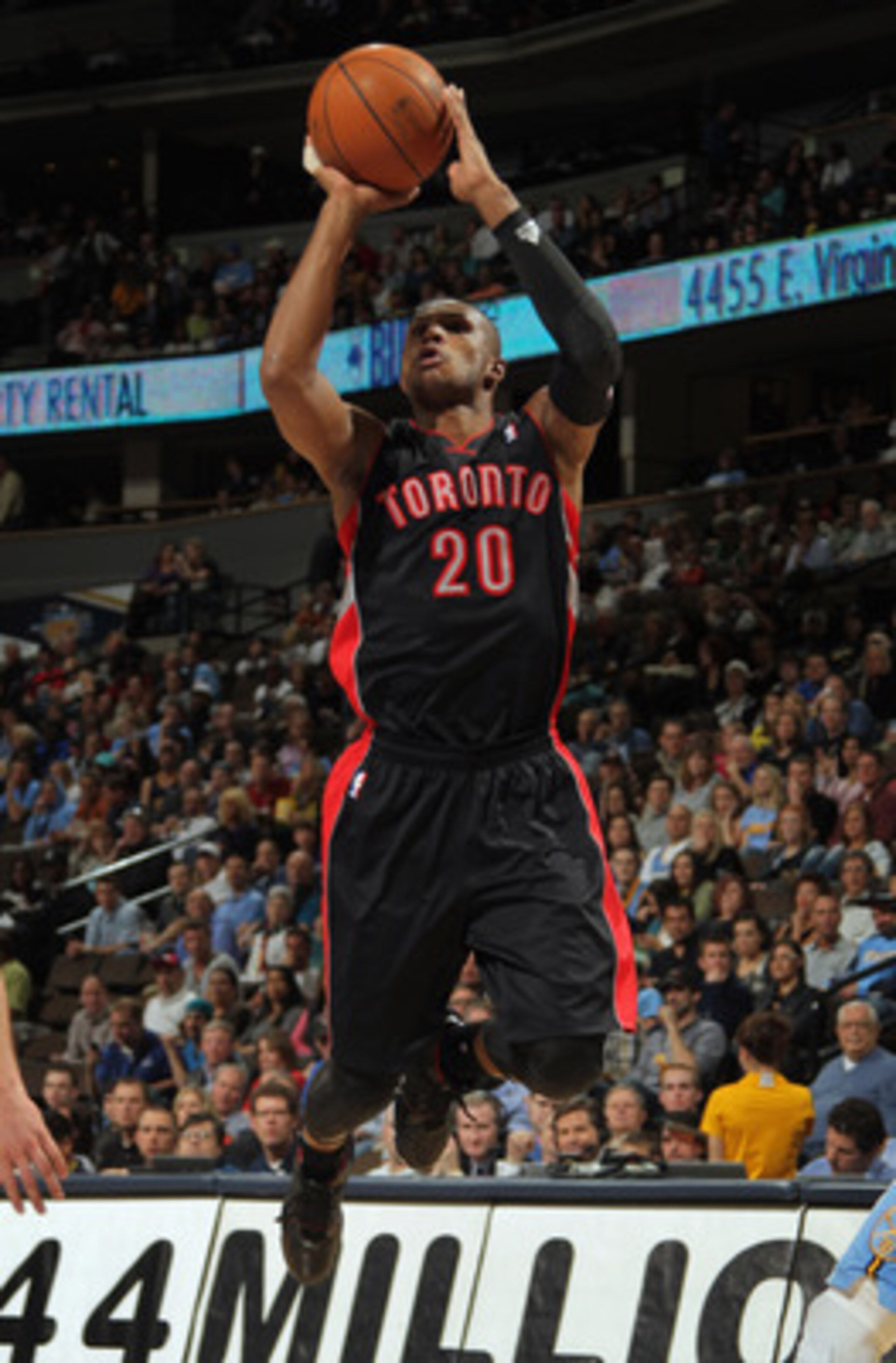 DENVER, CO - MARCH 21: Leandro Barbosa #20 of the Toronto Raptors takes a shot against the Denver Nuggets at the Pepsi Center on March 21, 2011 in Denver, Colorado. The Nuggets defeated the Raptors 123-90. NOTE TO USER: User expressly acknowledges and ag DENVER, CO - MARCH 21: Leandro Barbosa #20 of the Toronto Raptors takes a shot against the Denver Nuggets at the Pepsi Center on March 21, 2011 in Denver, Colorado. The Nuggets defeated the Raptors 123-90. NOTE TO USER: User expressly acknowledges and ag