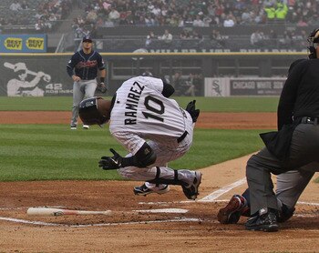 CHICAGO, IL - MAY 19: Alexei Ramirez #10 of the Chicago White Sox hits the ground after getting hit in the hand by a pitch from Fausto Carmona of the Cleveland Indians at U.S. Cellular Field on May 19, 2011 in Chicago, Illinois. (Photo by Jonathan Daniel/