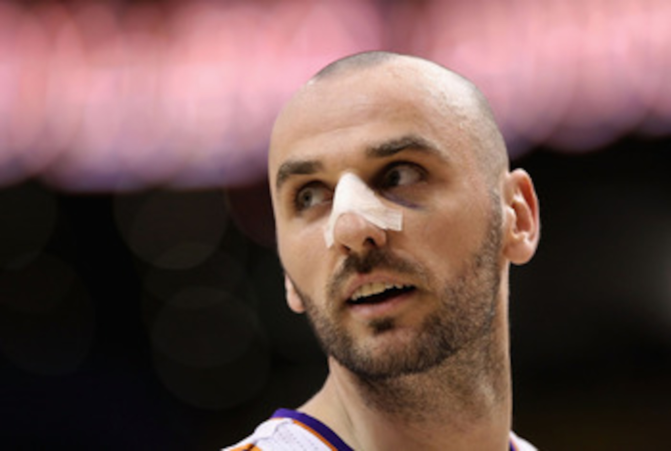 PHOENIX, AZ - MARCH 27:  Marcin Gortat #4 of the Phoenix Suns during the NBA game against the Dallas Mavericks at US Airways Center on March 27, 2011 in Phoenix, Arizona.  The Mavericks defeated the Suns 91-83. NOTE TO USER: User expressly acknowledges an