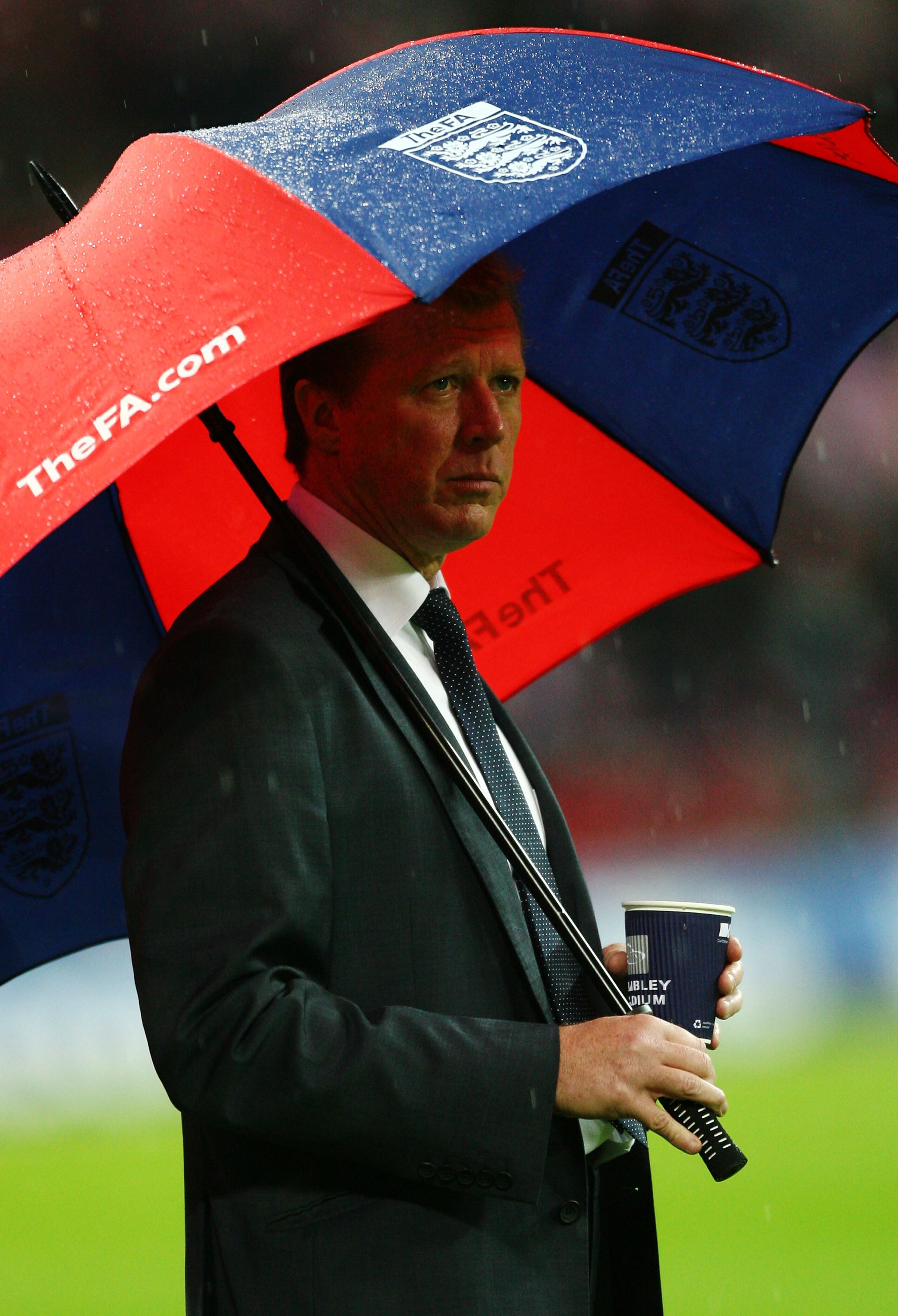 LONDON - NOVEMBER 21:  Steve McClaren manager of England looks on from under his umbrella prior to the Euro 2008 Group E qualifying match between England and Croatia at Wembley Stadium on November 21, 2007 in London, England.  (Photo by Alex Livesey/Getty