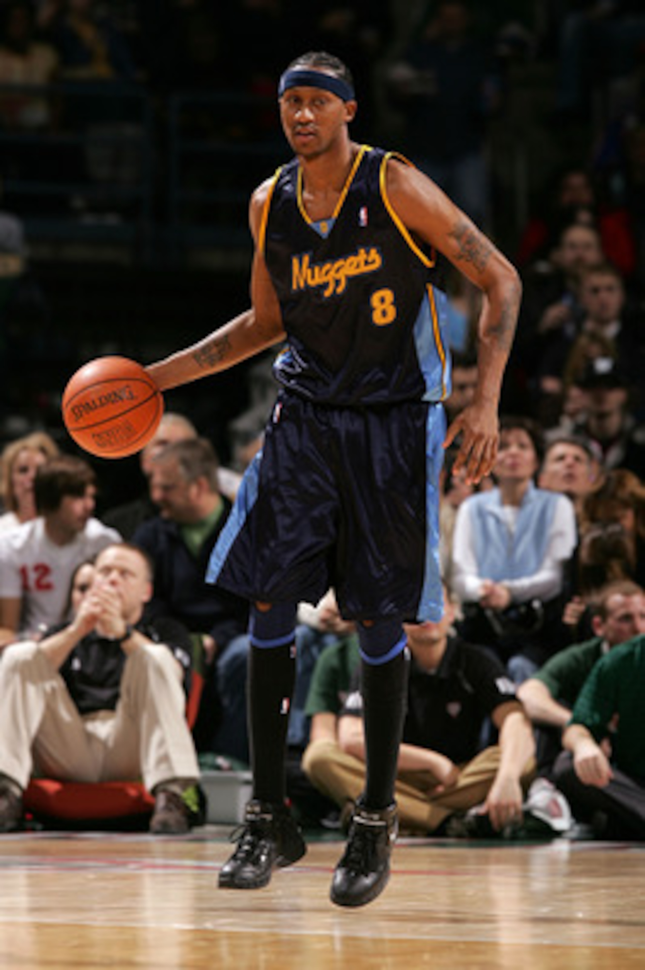 MILWAUKEE - FEBRUARY 10:  DerMarr Johnson #8 of the Denver Nuggets brings the ball up court against the Milwaukee Bucks February 10, 2007 at the Bradley Center in Milwaukee, Wisconsin. The Nuggets won 109-102.  (Photo by Jonathan Daniel/Getty Images)