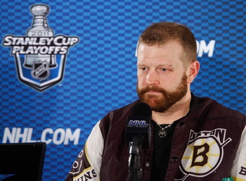TAMPA, FL - MAY 19:  Tim Thomas #30 of the Boston Bruins speaks to the media after their 2 to 0 victory over the Tampa Bay Lightning in Game Three of the Eastern Conference Finals during the 2011 NHL Stanley Cup Playoffs at St Pete Times Forum on May 19,