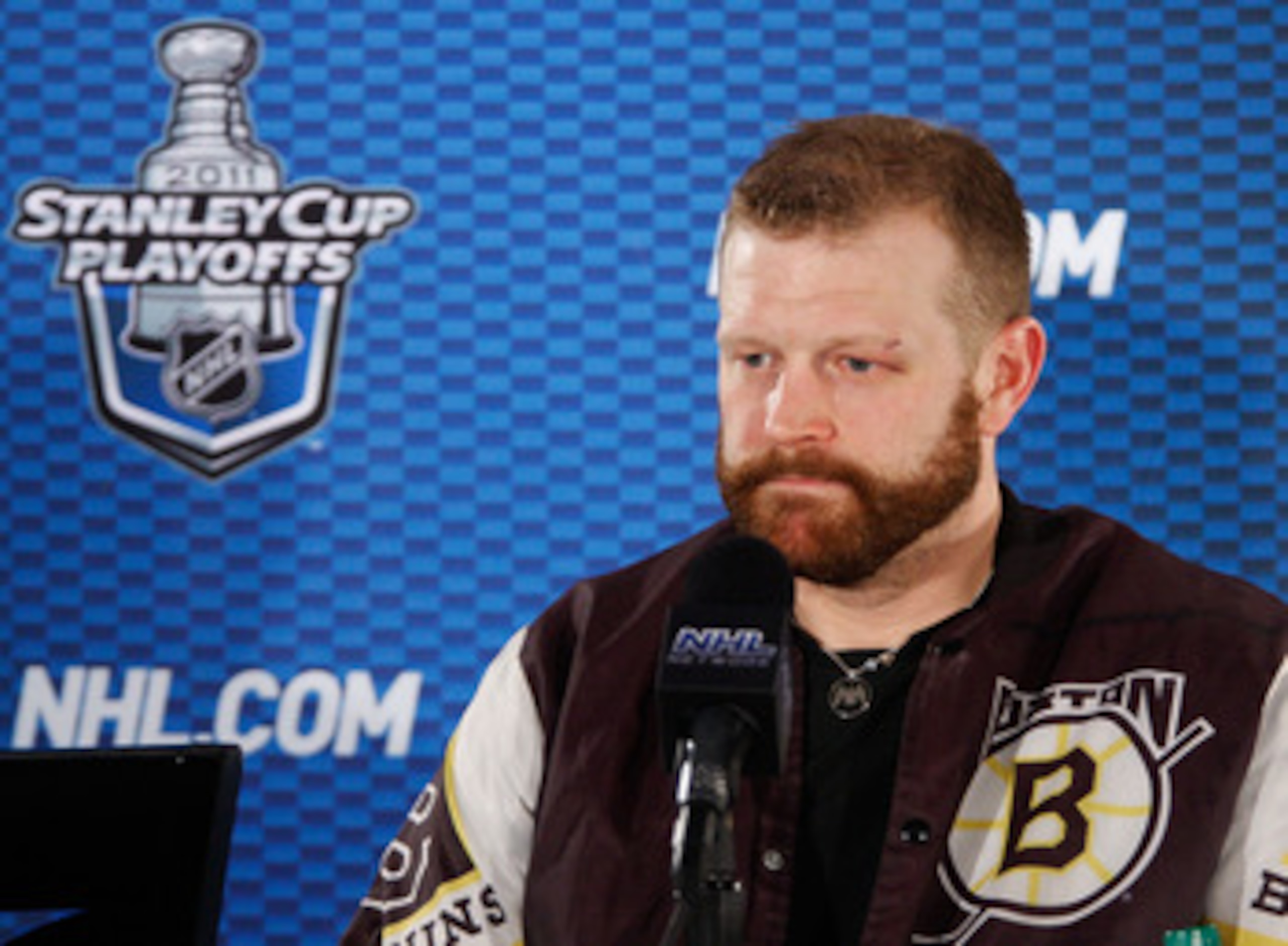 TAMPA, FL - MAY 19:  Tim Thomas #30 of the Boston Bruins speaks to the media after their 2 to 0 victory over the Tampa Bay Lightning in Game Three of the Eastern Conference Finals during the 2011 NHL Stanley Cup Playoffs at St Pete Times Forum on May 19,