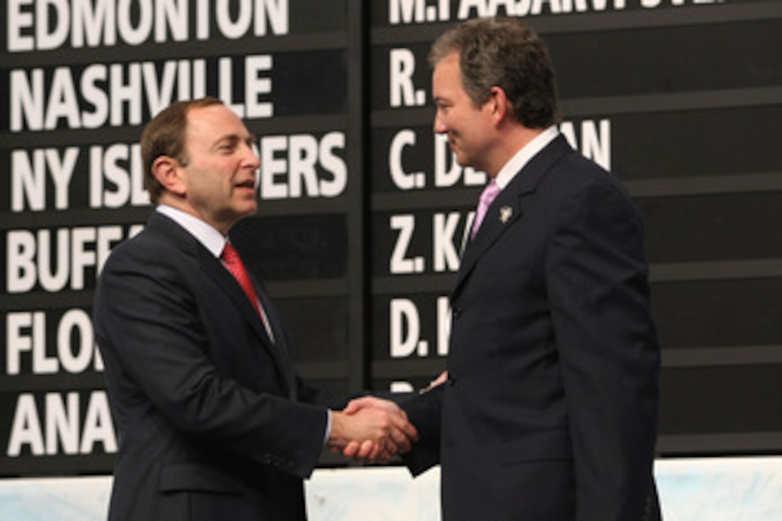 MONTREAL, QC - JUNE 26:  Executive Vice President and General Manager Ray Shero of the Pittsburgh Penguins greets NBA Commissioner Gary Bettman on stage during the first round of the 2009 NHL Entry Draft at the Bell Centre on June 26, 2009 in Montreal, Qu