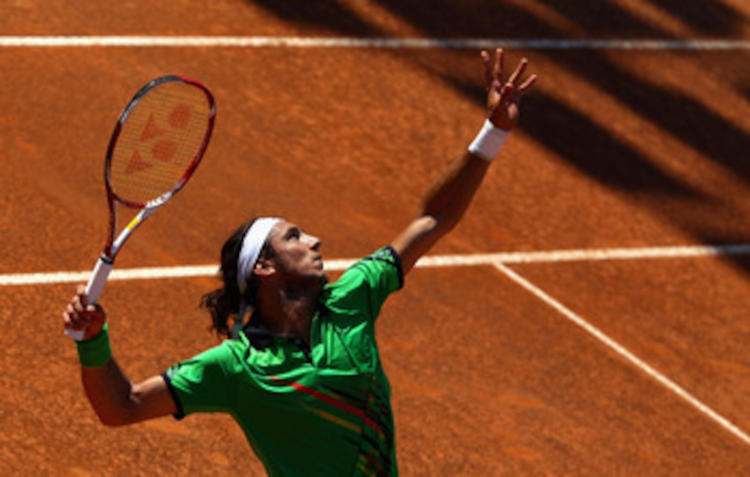 ROME, ITALY - MAY 10: Juan Monaco of Argentina  serve during his second round match against Tomas Berdych of Czech Republic during day three of the Internazoinali BNL D'Italia at the Foro Italico Tennis Centre on May 10, 2011 in Rome, Italy.  (Photo by Cl