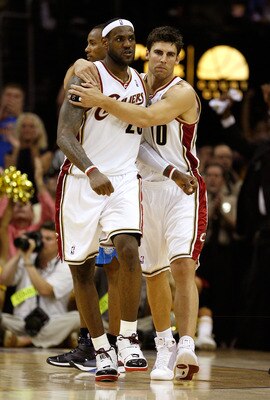 CLEVELAND - MAY 28:  LeBron James #23 of the Cleveland Cavaliers reacts with teammate Wally Szczerbiak #10 after defeating the Orlando Magic in Game Five of the Eastern Conference Finals during the 2009 Playoffs at Quicken Loans Arena on May 28, 2009 in C