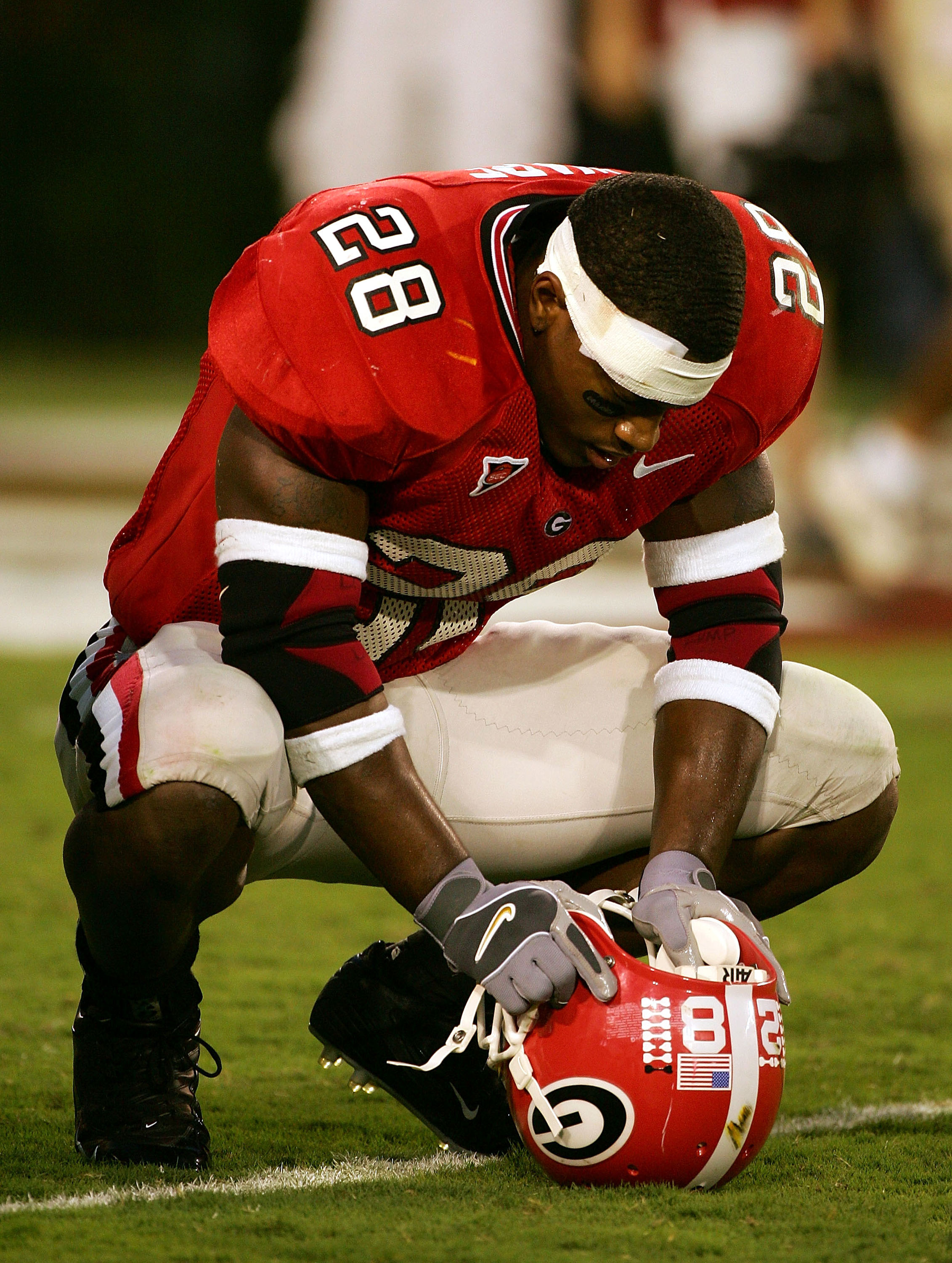 ATHENS, GA - OCTOBER 9:  Danny Ware #28 of the Georgia Bulldogs sits in the endzone dejected after a 19-14 upset at the hands of the Tennessee Volunteers at Sanford Stadium on October 9, 2004 in Athens, Georgia.  (Photo by Scott Halleran/Getty Images)