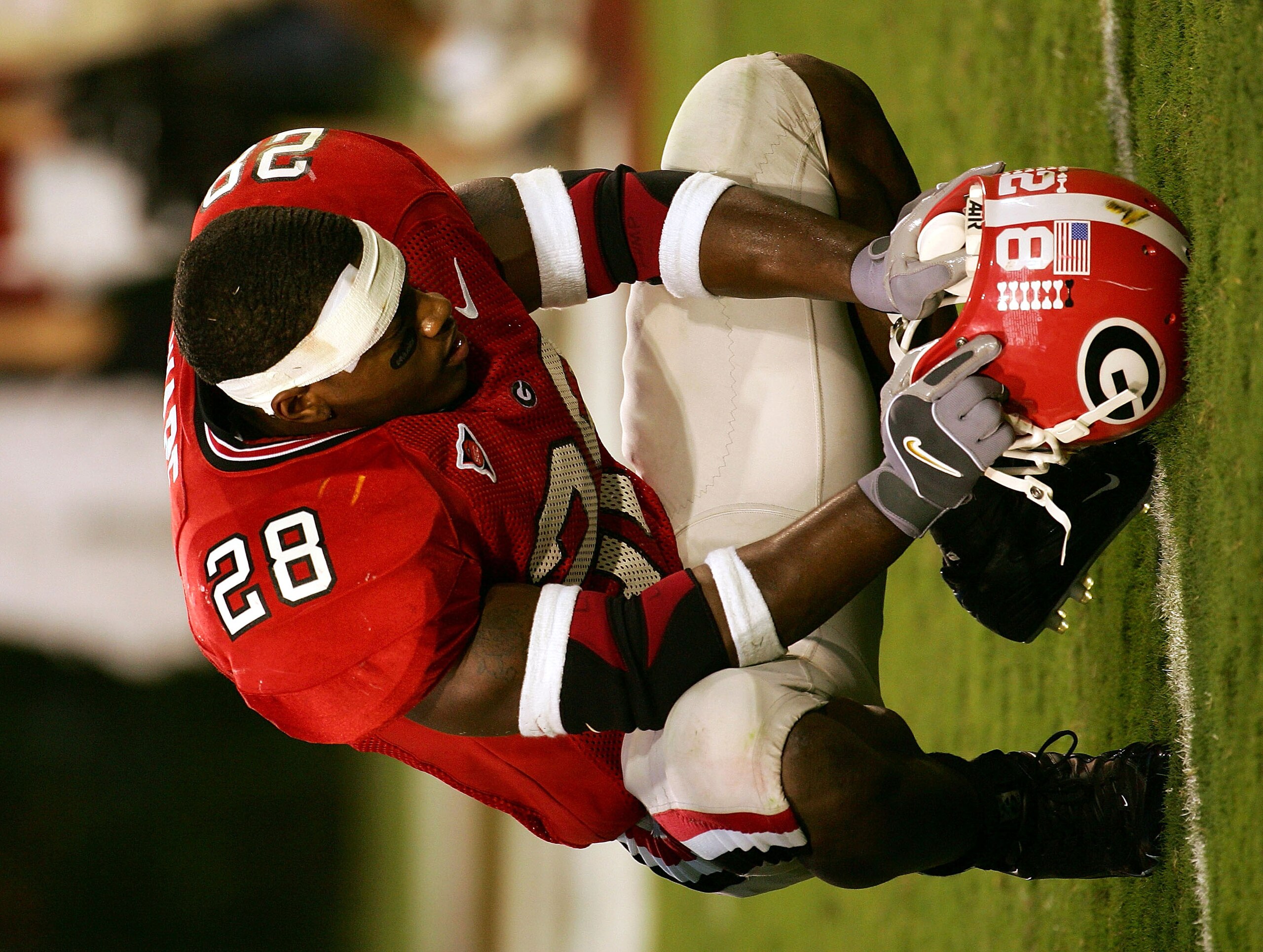 ATHENS, GA - OCTOBER 9:  Danny Ware #28 of the Georgia Bulldogs sits in the endzone dejected after a 19-14 upset at the hands of the Tennessee Volunteers at Sanford Stadium on October 9, 2004 in Athens, Georgia.  (Photo by Scott Halleran/Getty Images)