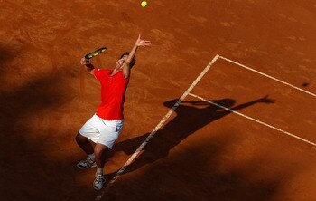 ROME, ITALY - MAY 12:  Richard Gasquet of France  serves during his third round match against Roger Federer of Switzerland during day five of the Internazoinali BNL D'Italia at the Foro Italico Tennis Centre on May 12, 2011 in Rome, Italy.  (Photo by Cliv