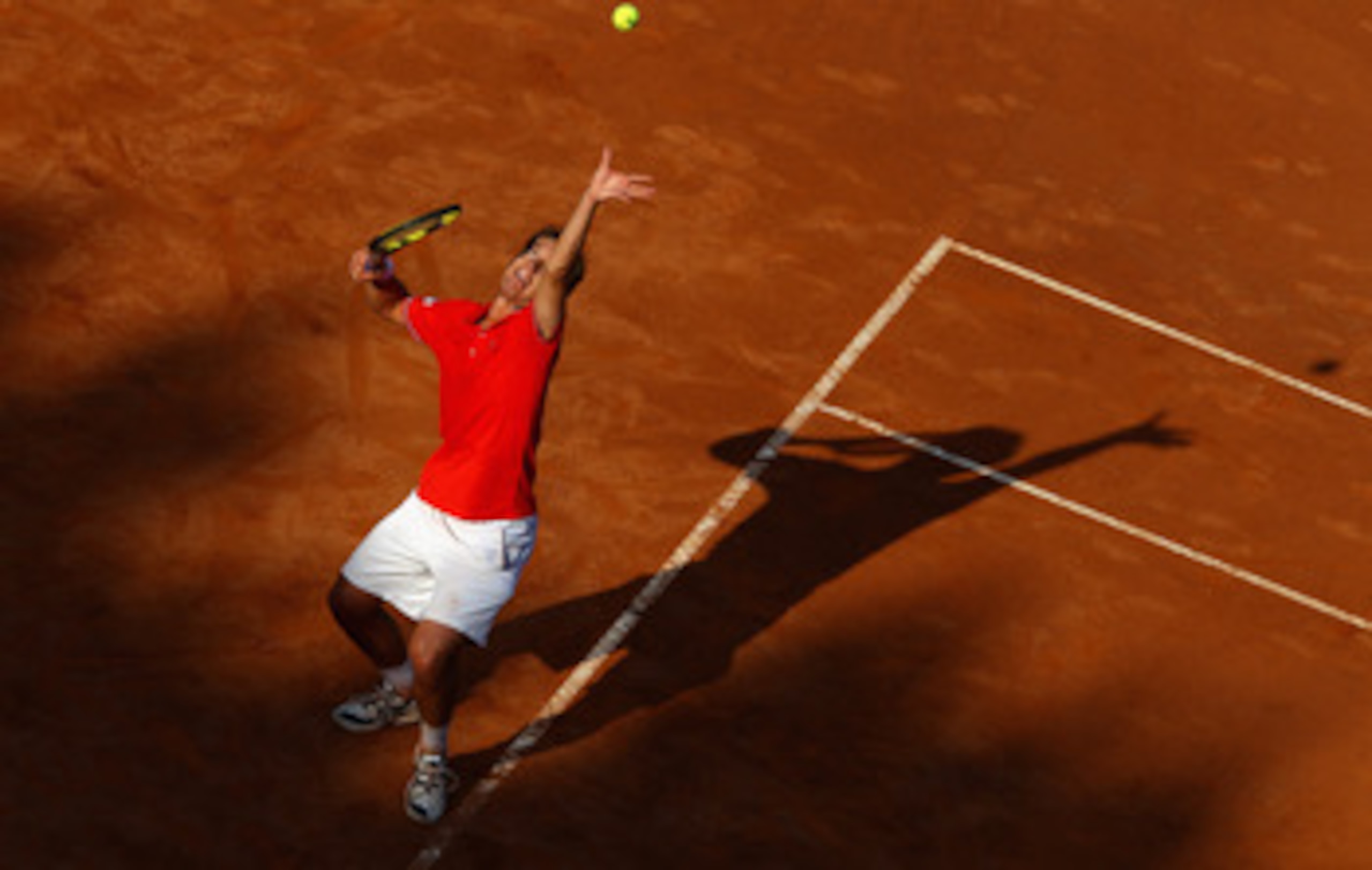 ROME, ITALY - MAY 12:  Richard Gasquet of France  serves during his third round match against Roger Federer of Switzerland during day five of the Internazoinali BNL D'Italia at the Foro Italico Tennis Centre on May 12, 2011 in Rome, Italy.  (Photo by Cliv