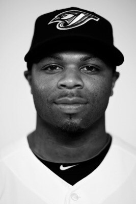 DUNEDIN, FL - FEBRUARY 20: (EDITORS NOTE: Image has been converted to black and white.) Rajai Davis #11 of the Toronto Blue Jays poses during photo day at Florida Auto Exchange Stadium on February 20, 2011 in Dunedin, Florida.  (Photo by Nick Laham/Getty